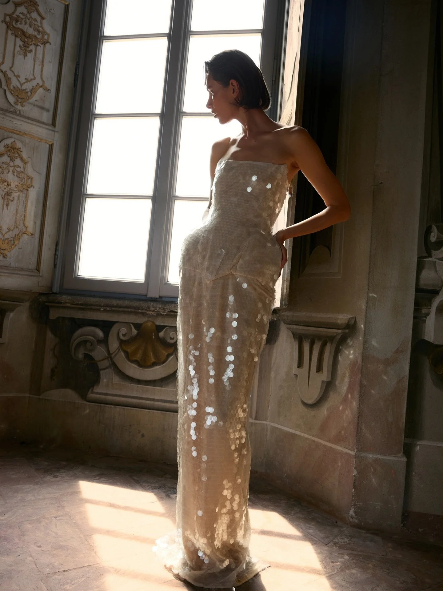 BALYKINA &mdash; Alina Balykina brings a chic, modern vision to bridal fashion as reflected in the Muna Dress &mdash; catching the light without being ostentatious, evoking the feeling of skin glowing from within.

Timeless silhouettes, refined detai