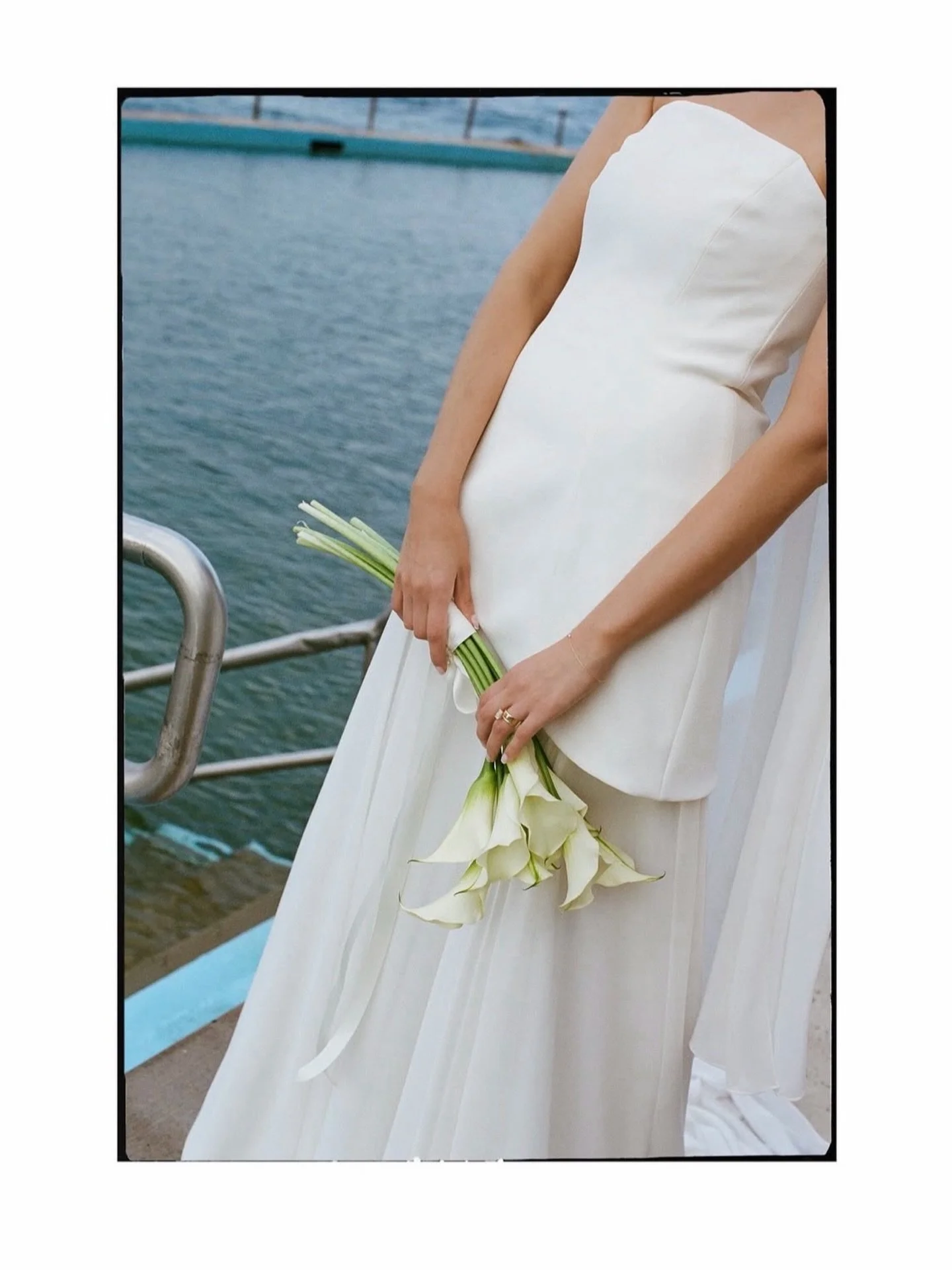 AS SEEN ON &mdash; glowing bride @kelseybales wearing @sophieetvoilabridal Julie gown. 

An iconic @sophieetvoilabridal silhouette, the Julie gown is the definition of subtlety. Strech crepe sculpted into the shape of a tulip, paired with a chiffon s