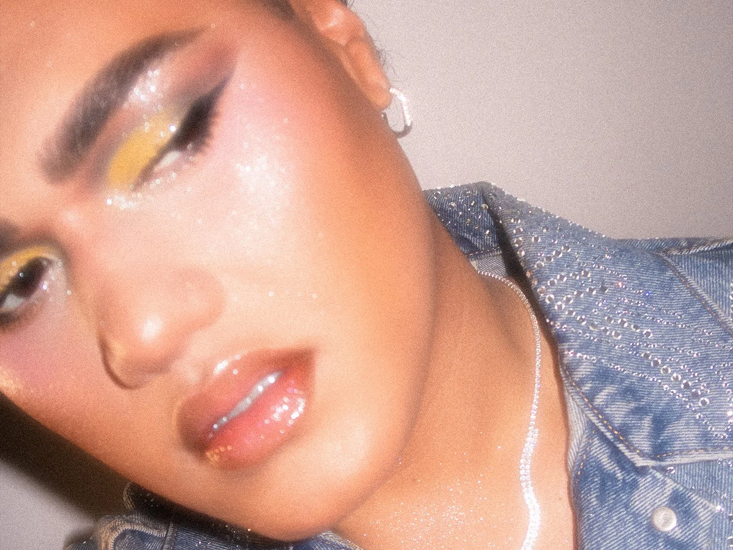 Kylee De Thier in a yellow makeup look wearing Beyonce Levi's denim