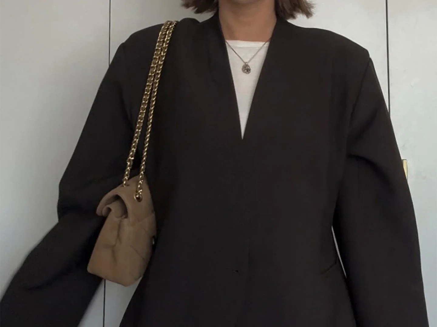Molly Cochrane wearing a brown blazer