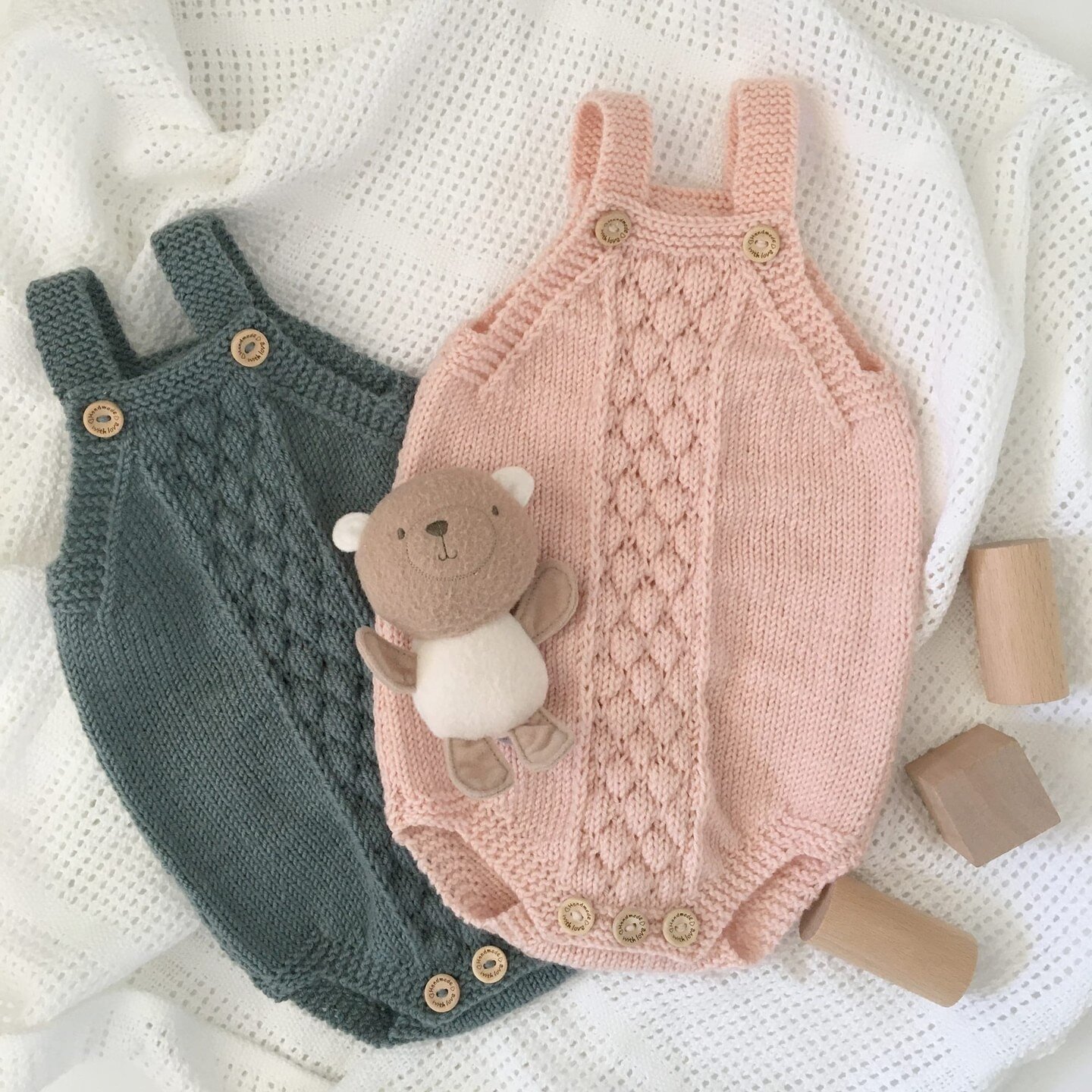 Bubble Stitch romper knitted in Rico Essentials Merino DK shades Patina and Pearl Pink. Pattern includes sizes from newborn to 2 years⁣
#bubblestitchromper #bubblestitch #romperpattern #babyromper #babyromperpattern #knittingpattern #lovefibrespattte