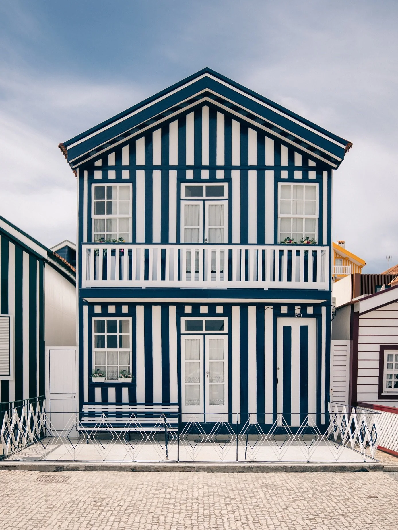 This cheerful striped town will leave you with a smile. In the 19th century, Costa Nova (just outside Aveiro) became a summer escape for Portugal&rsquo;s elite. But its famous candy-colored houses weren&rsquo;t always vacation homes; initially, they 
