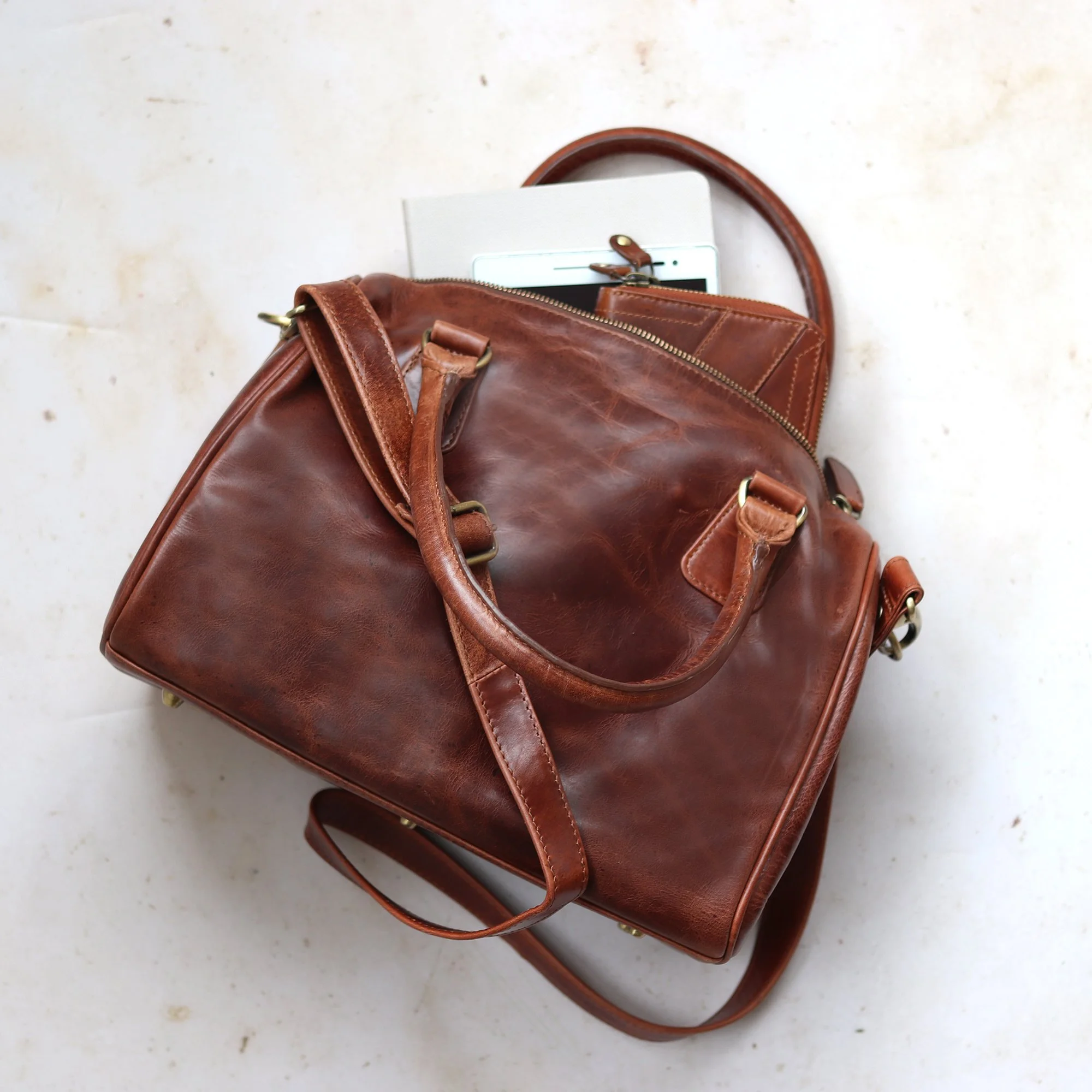 Peggy-brown-leather-barrel-handbag-image-1.jpg