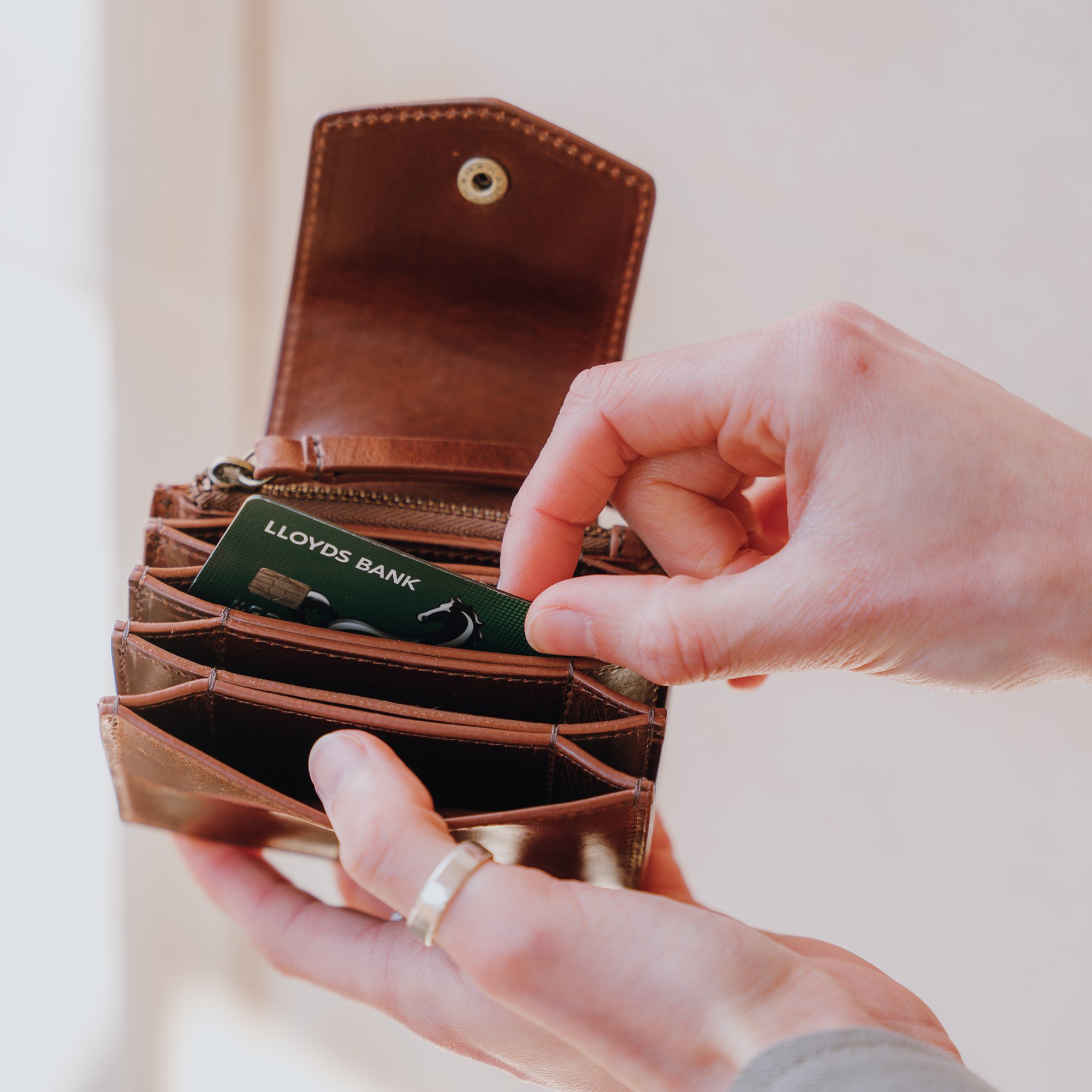 Ginny- brown-leather-card-wallet-with-coin-section-model (3).jpg