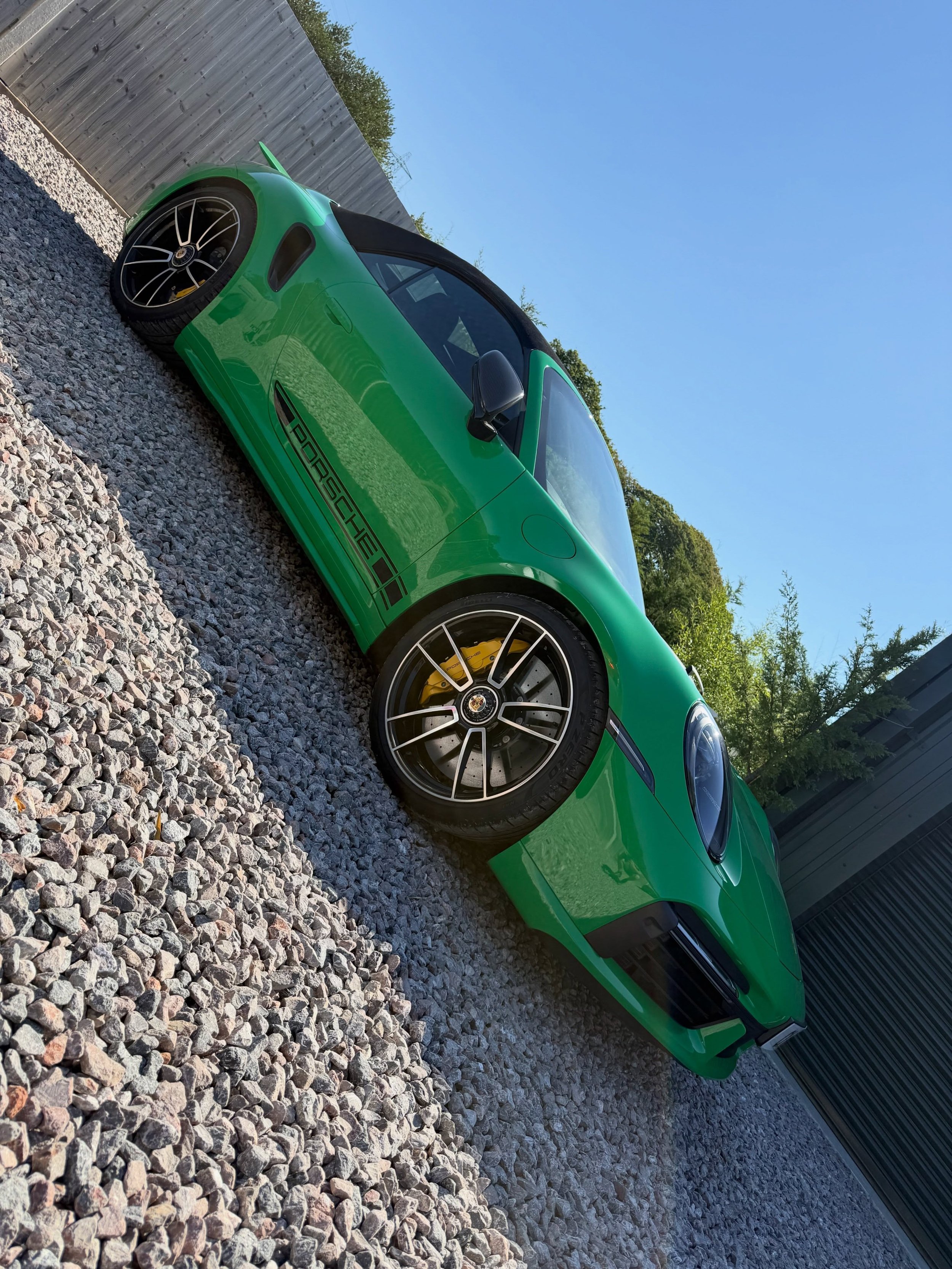Stunning Porsche 992 Turbo S cab heads out to enjoy the sun. Perfect spec coupled with Python Green makes this one of our all time favourite client cars. #porsche #turbos #porscheuk #912 #supercar