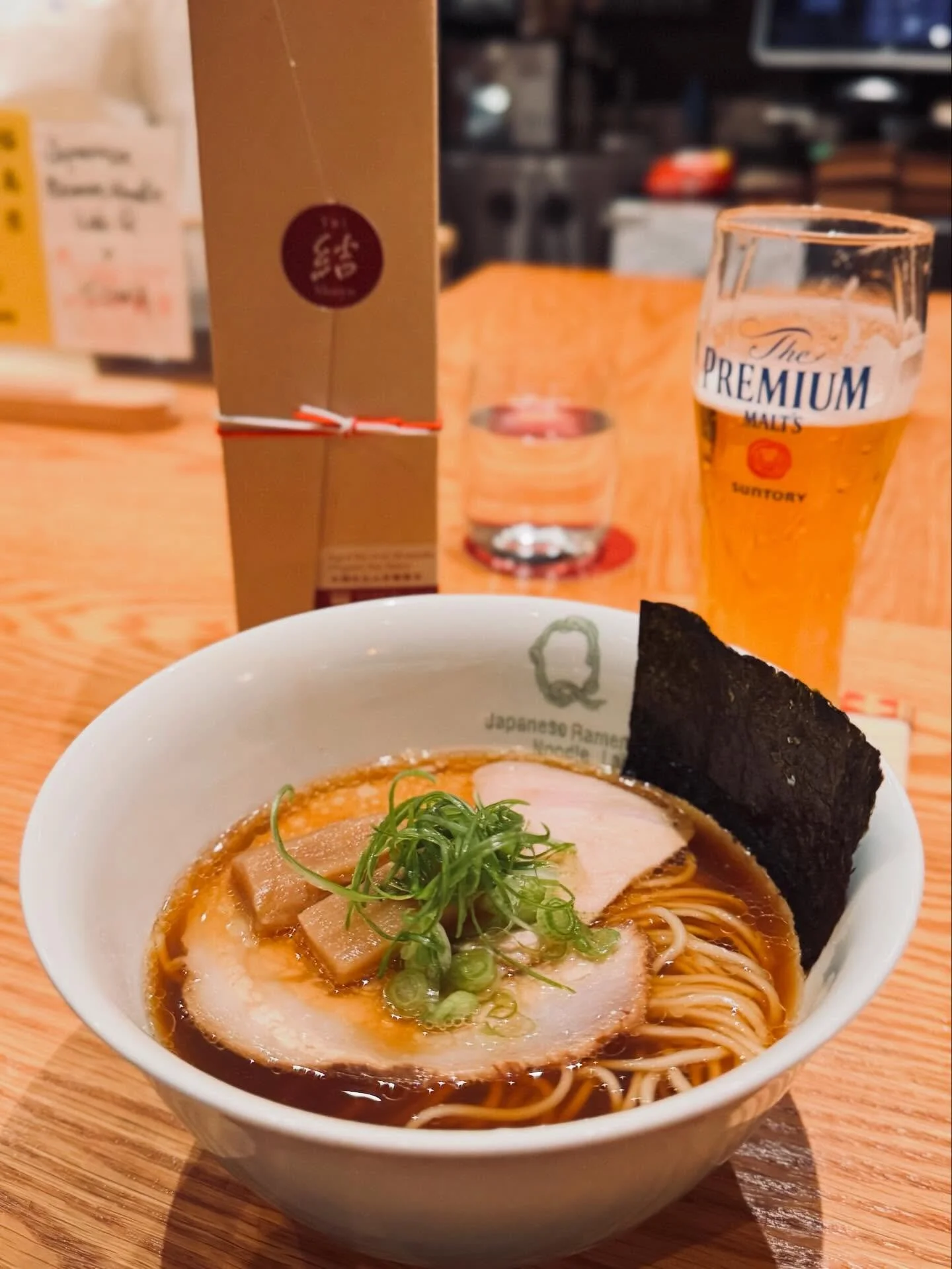 Sapporo&rsquo;s legendary Japanese Ramen Noodle Lab Q has arrived in NYC. Chef Hiroshi Hiraoka&rsquo;s tanrei ramen is a study in transparency, powered by the exceptional depth of Adachi Shoyu. 
A broth this refined demands a counterpart that can kee