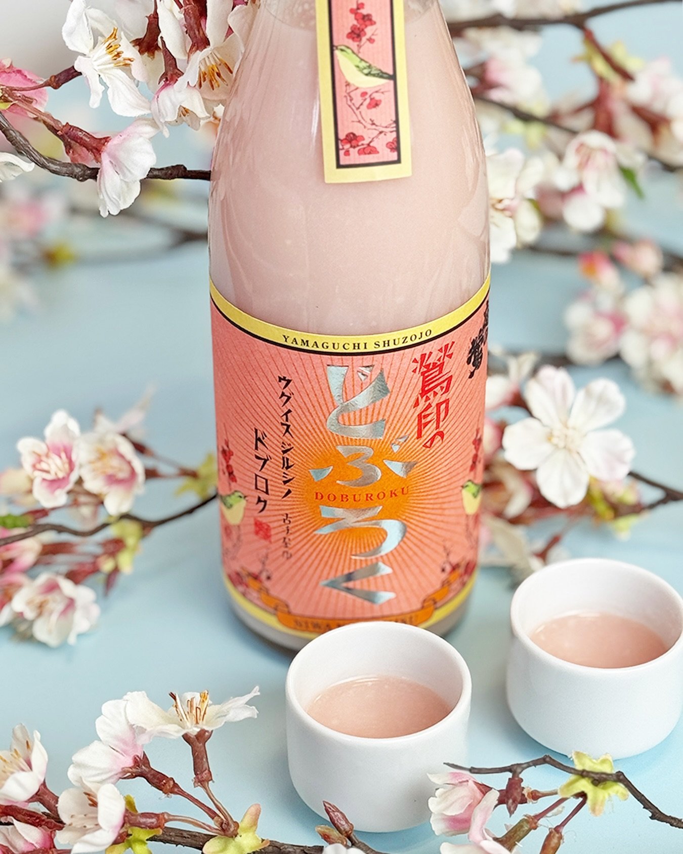 Cherry blossoms are in full bloom🌸 Let&rsquo;s enjoy the beautiful sakura season with pink doburoku from Niwa no Uguisu before the final petals fall 🍶🩷🐦 This 100% unfiltered sake is a sweet, tart treat crafted with the power of the famously finic