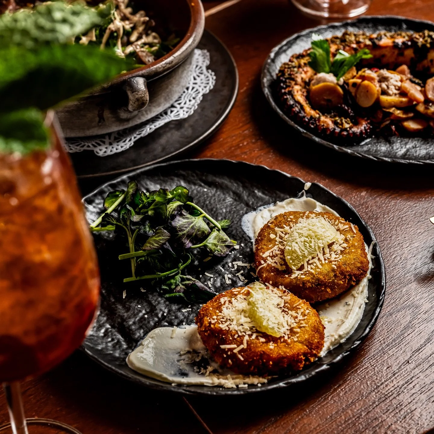 Crispy zucchini cakes served with feta and fresh herbs 

#eatnyc #zuchinicake #midtownmanhattan #hellskitchennyc