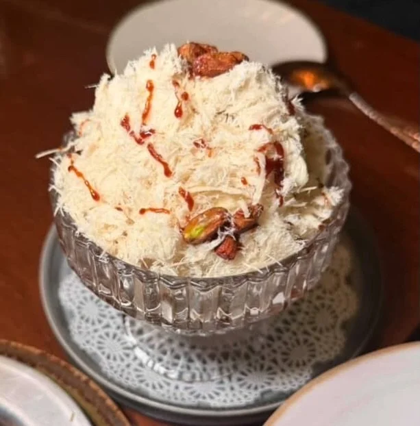 What we&rsquo;re enjoying for Shavuot

HALVA SILAN SUNDAE
House-made vanilla ice cream on top of caramelized rice crispies &amp; almonds topped with date syrup

📸: @thecarboholic 

#shavuot #eatnyc #hellskitchennyc #restaurantsnyc