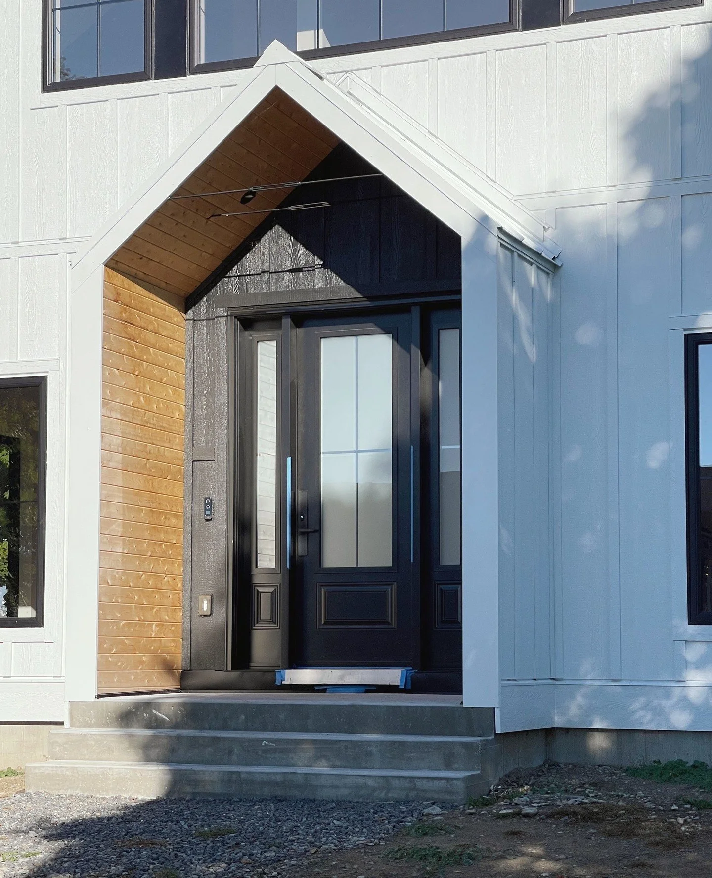 Charming, understated, and full of character. This country home welcomes you with crisp white board-and-batten siding and a pop of black, leading straight into an airy, open-concept living, dining, and kitchen space. Simple elegance, inside and out. 