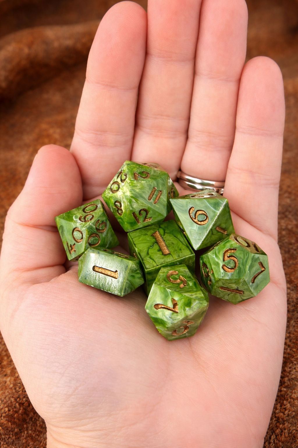 4. 7_Heartwood Dice  - Scale in Hand.png