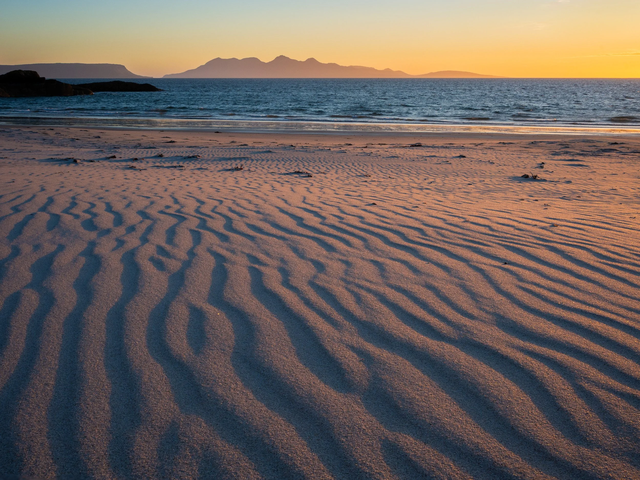 Landscape photography of the Isle of Rùm at sunset, Scottish Highlands.