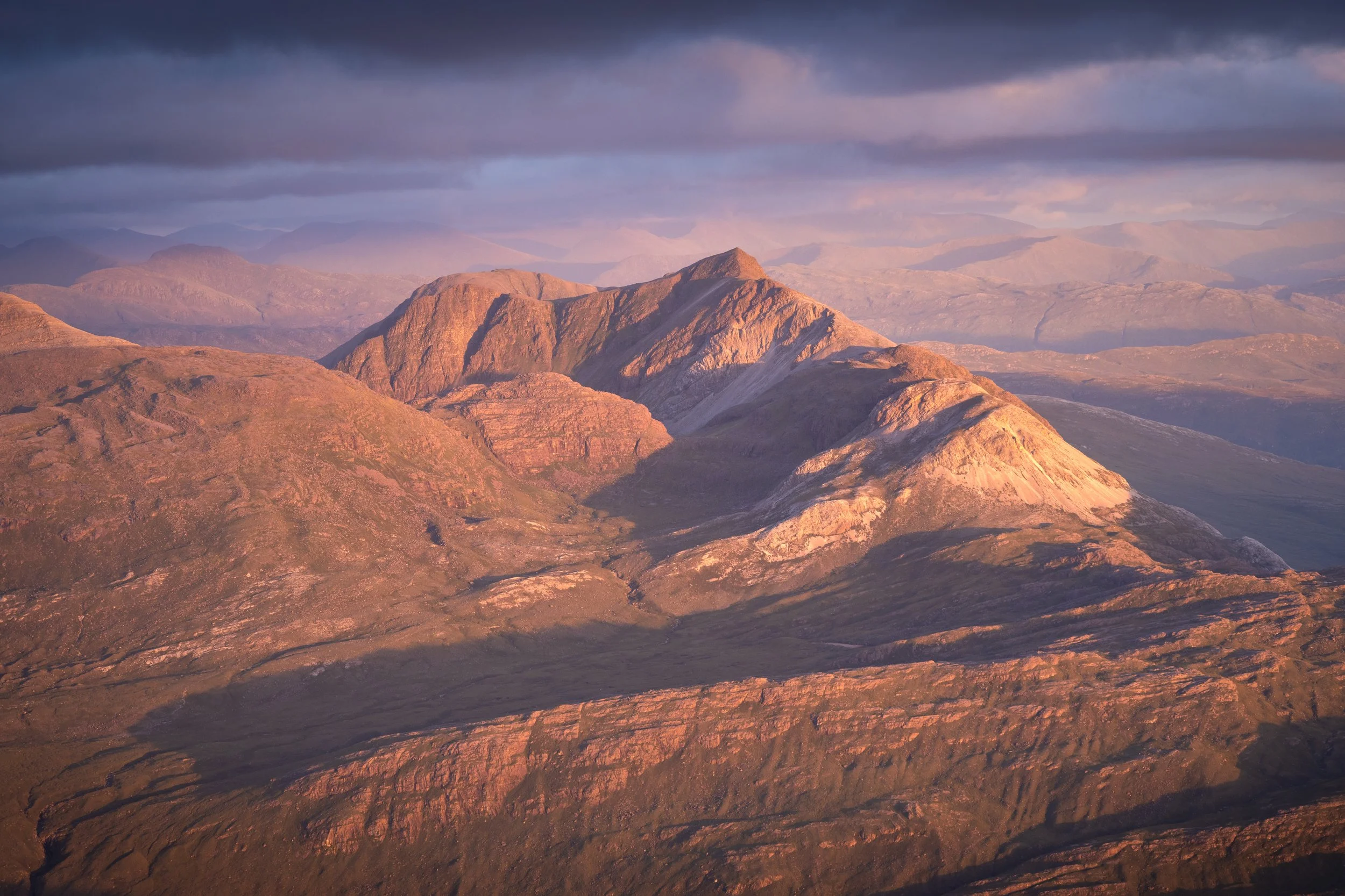 Sgorr Ruadh from Liathach at sunset in Torridon in the Scottish Highlands.