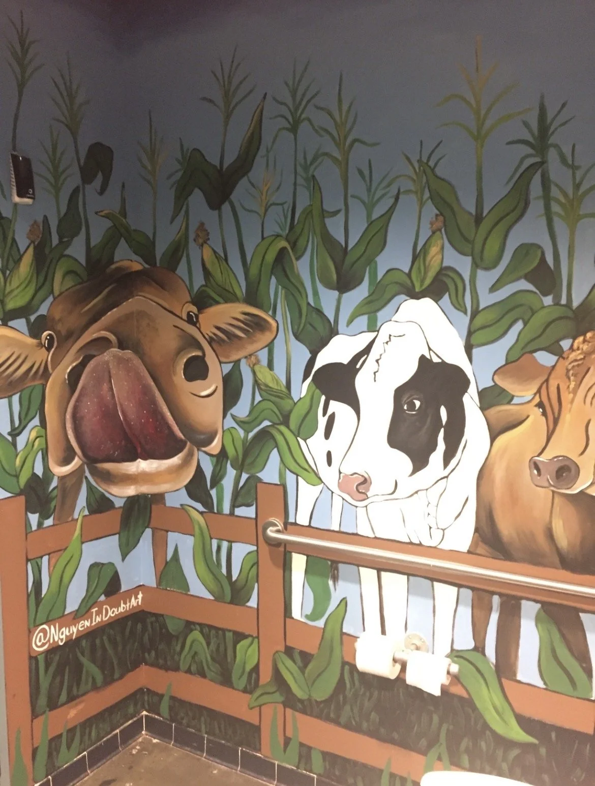 Mural in restroom for The Pig and The Pearl, a restaurant in Atlanta, Georiga.