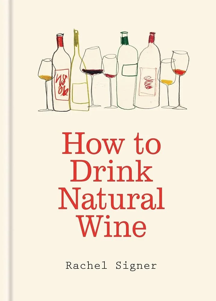 Book cover titled "How to Drink Natural Wine" by Rachel Signer, featuring an illustration of several wine bottles and glasses with different colored wine.