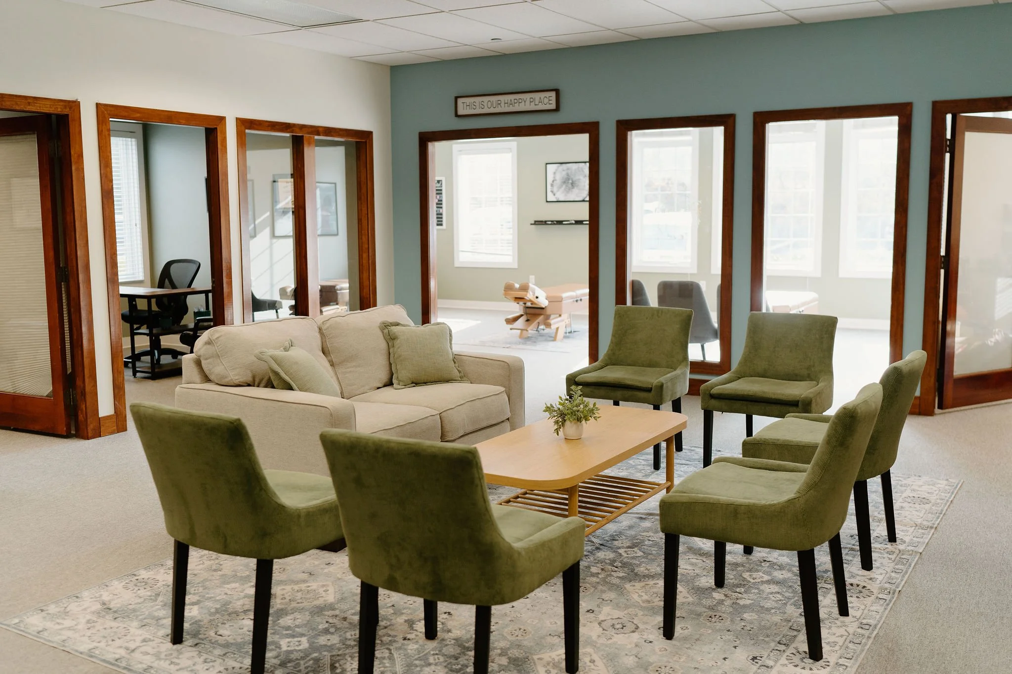 Deep Rooted Chiropractic's cozy waiting area, designed to make your family feel at home!