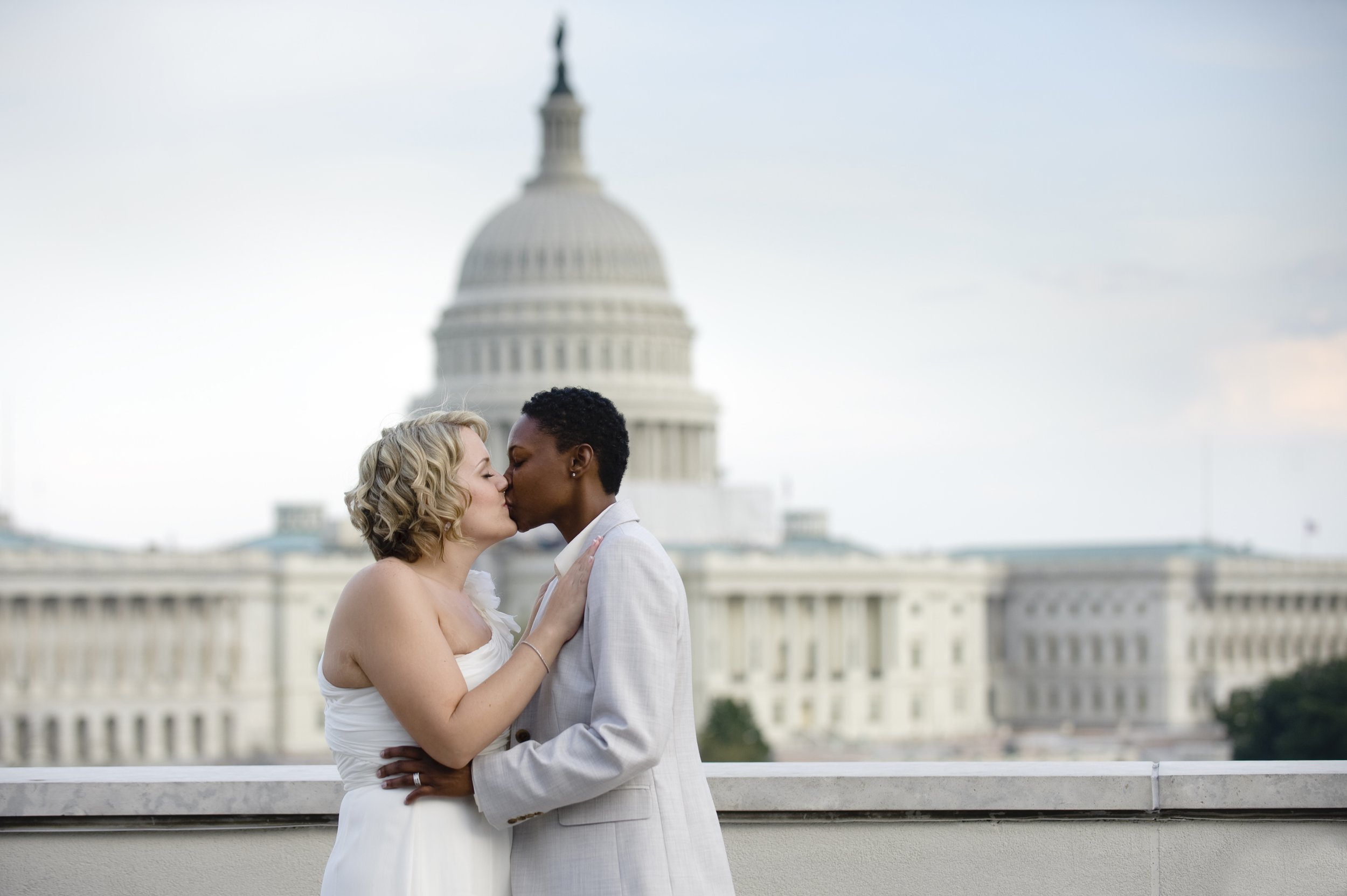(photo by Erin Scott) Washington, D.C., March 15, 2012: Courtney and Alexis Givhan share their first kiss as a married couple. The couple traveled from Texas to elope in Washington, where LGBTQ weddings were legally recognized. 