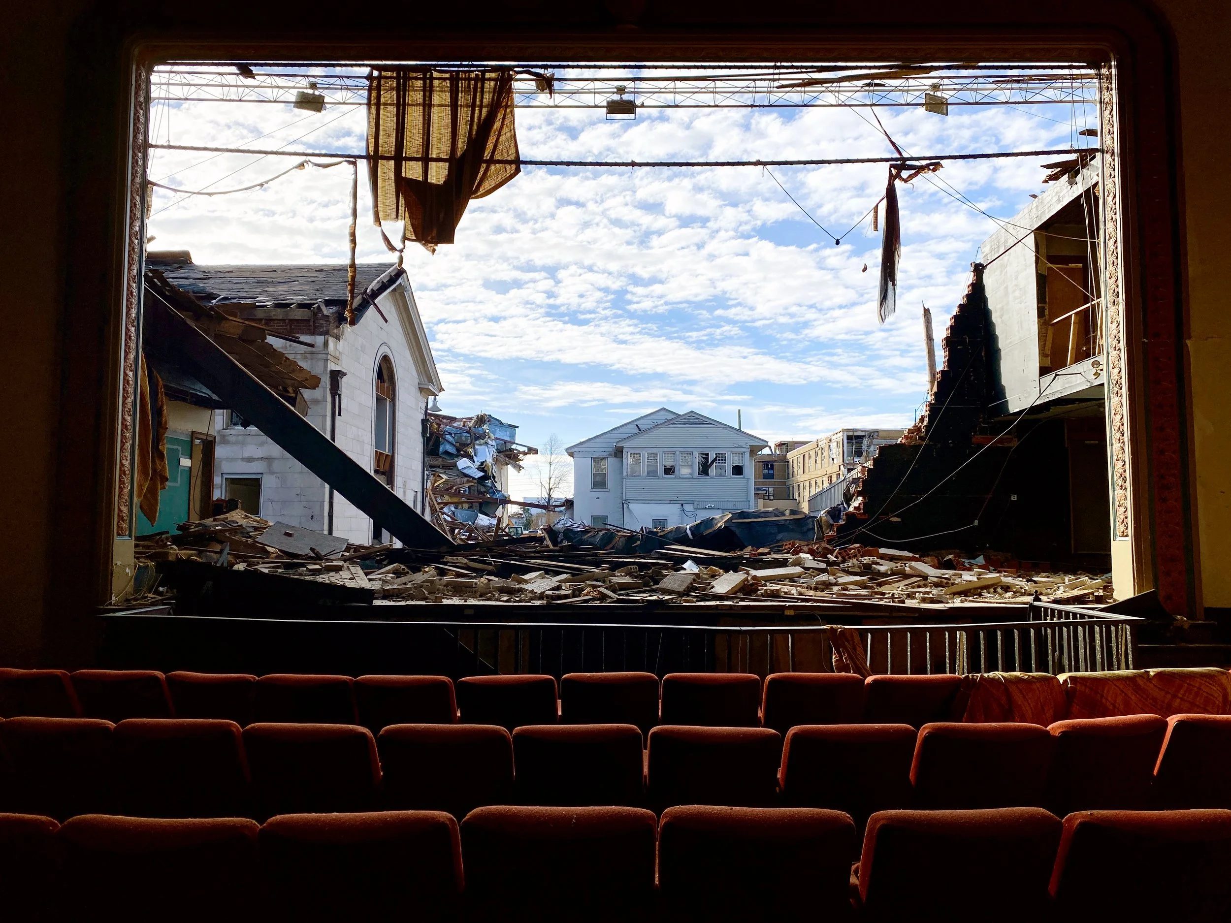 (Jocelyn Augustino for FEMA) Mayfield, Ky., Feb., 1, 2022: The American Legion Theater sustained damage by the December 10, 2022 tornadoes, tearing down the theater screen to expose damage outside of the building.