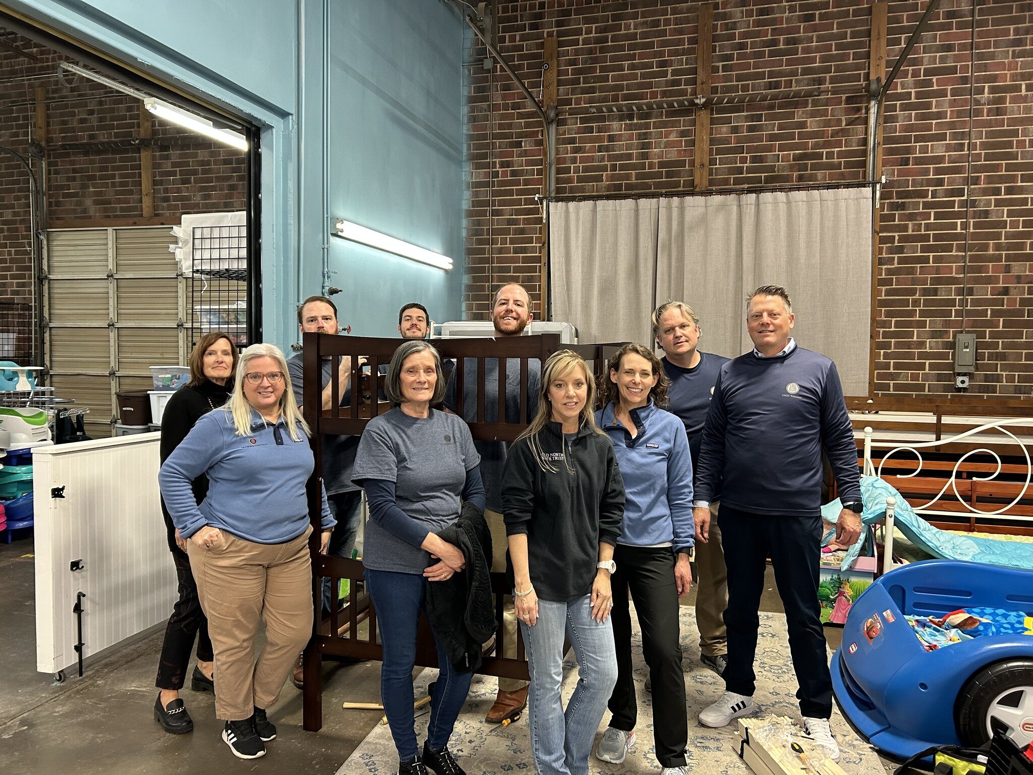 Volunteer Spotlight: Old North State Trust! 
This group organized the remaining coats from winter, began the process of getting swimsuits organized to go out for families that foster and built a bunk bed! Thank you so much for taking the time to help