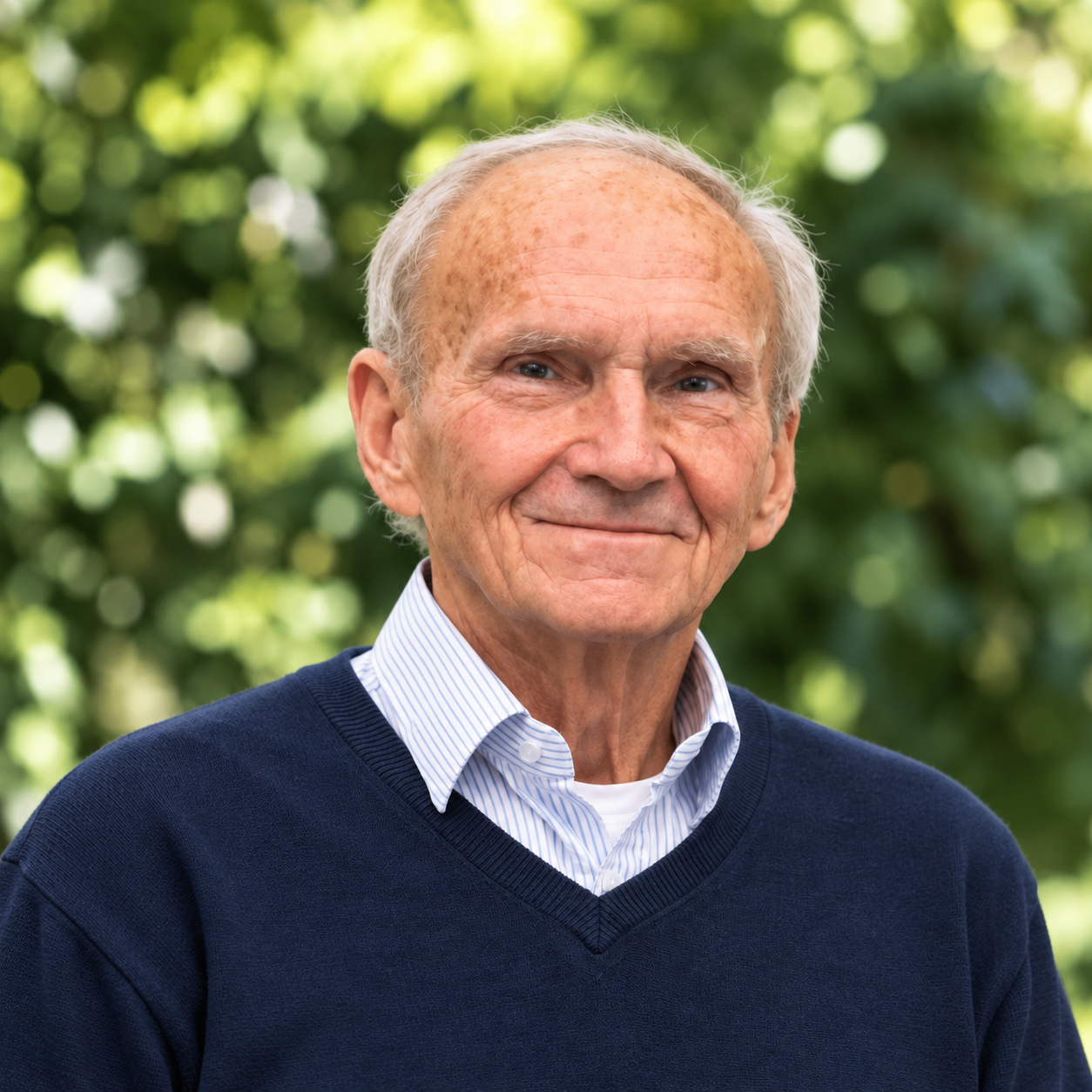 Warm Elderly Portrait in Greenery