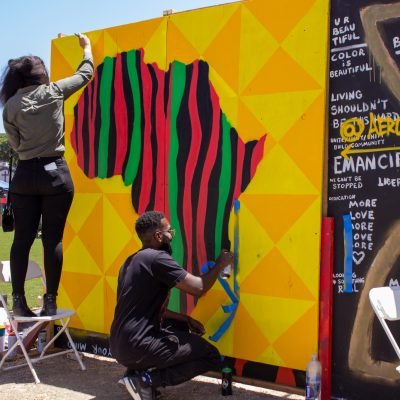 People painting African mural (Copy)