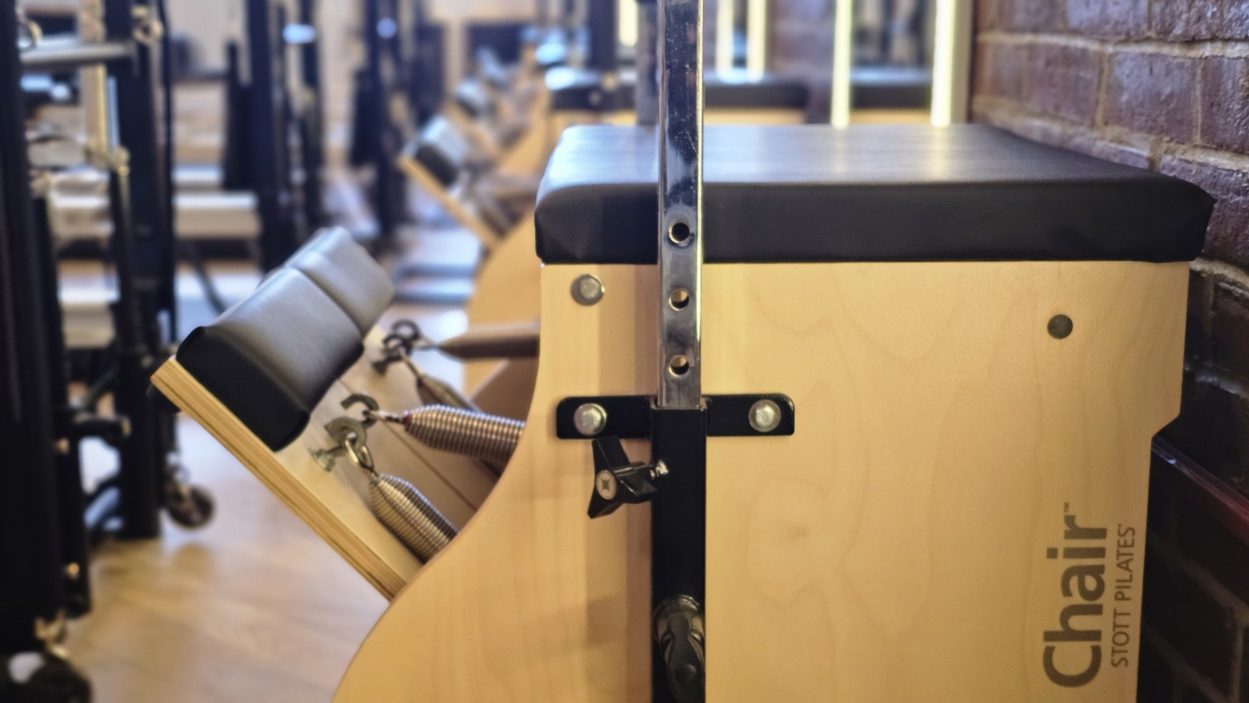 Stott Pilates chair equipment at Pilates Plus Red Bank