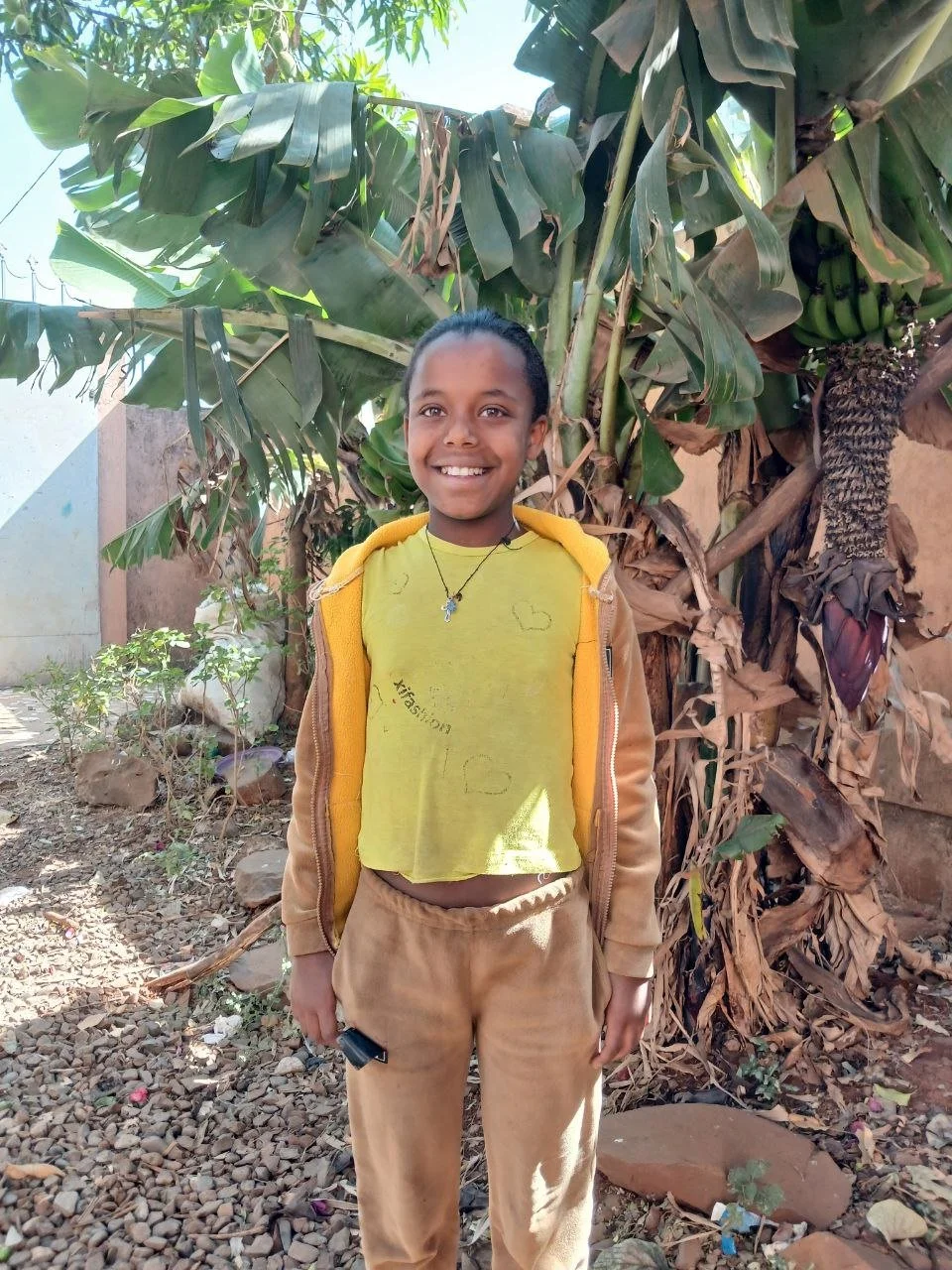 Hilina | Age 11 | Grade 3 | Hilina's parents passed away, she lives with her older sister. She loves jump roping and singing. 