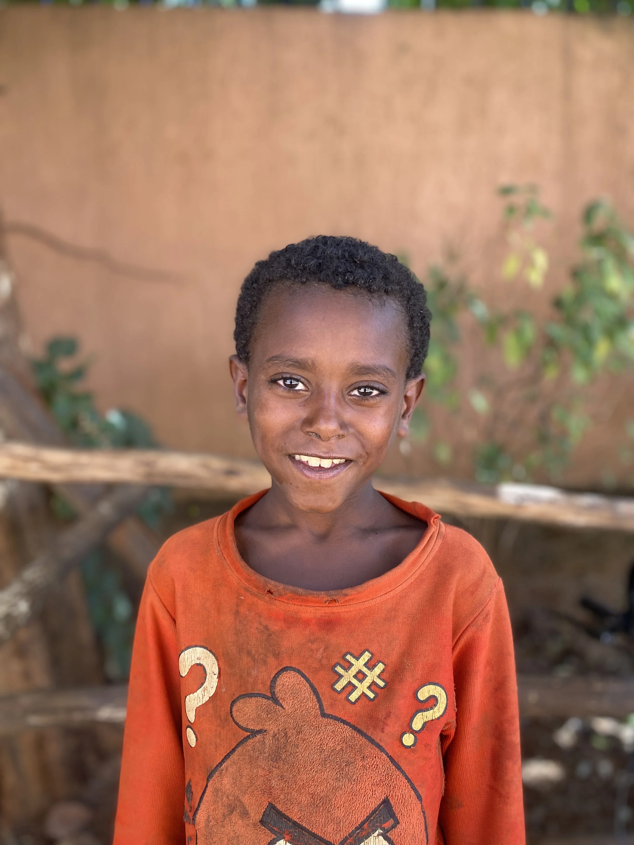 Nurhussan | Age 10 | Grade 3 | He loves art and playing with his friends. When he grows up he wants to be a teacher. 