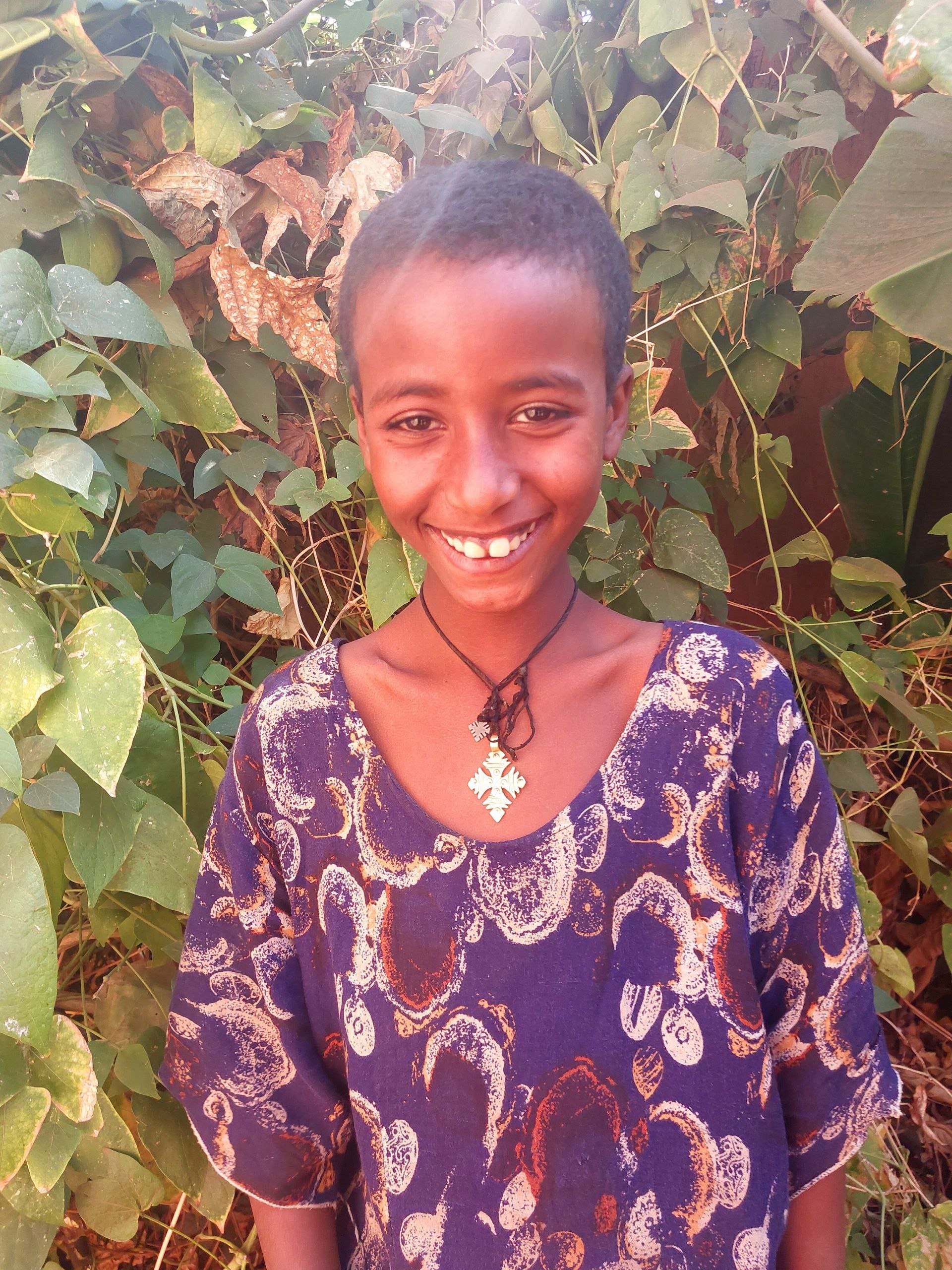 Meseret | 10yrs old | Grade 3 | Meseret lives with her sister and grandparents. Both of her parents passed away. She loves playing Ethiopian games and wants to be a doctor when she grows up. 