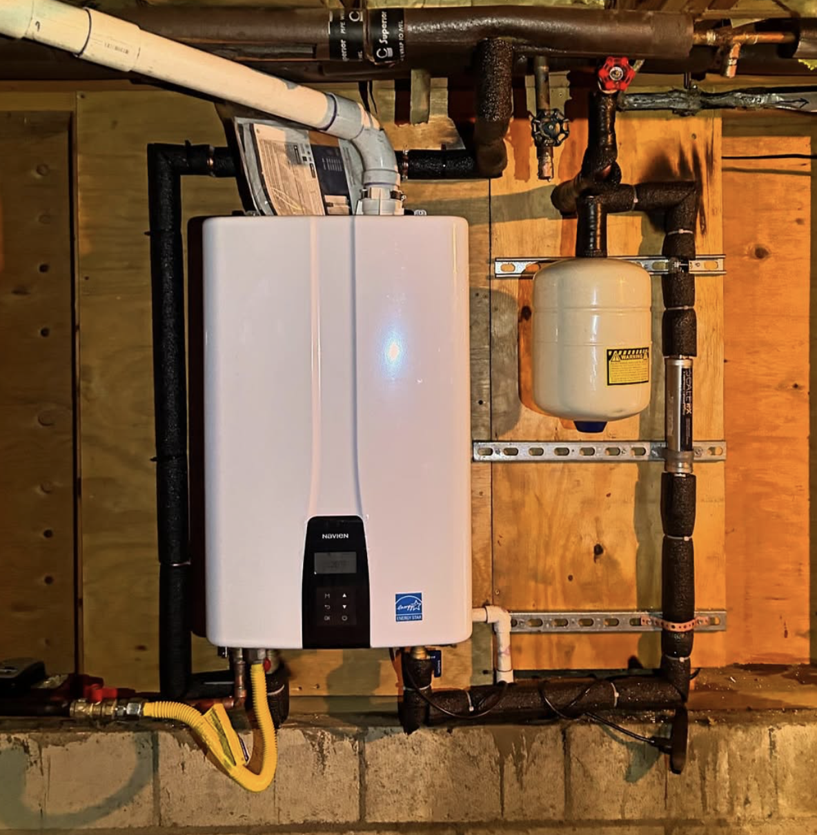 mountain mechanical installs navien tankless water heaters