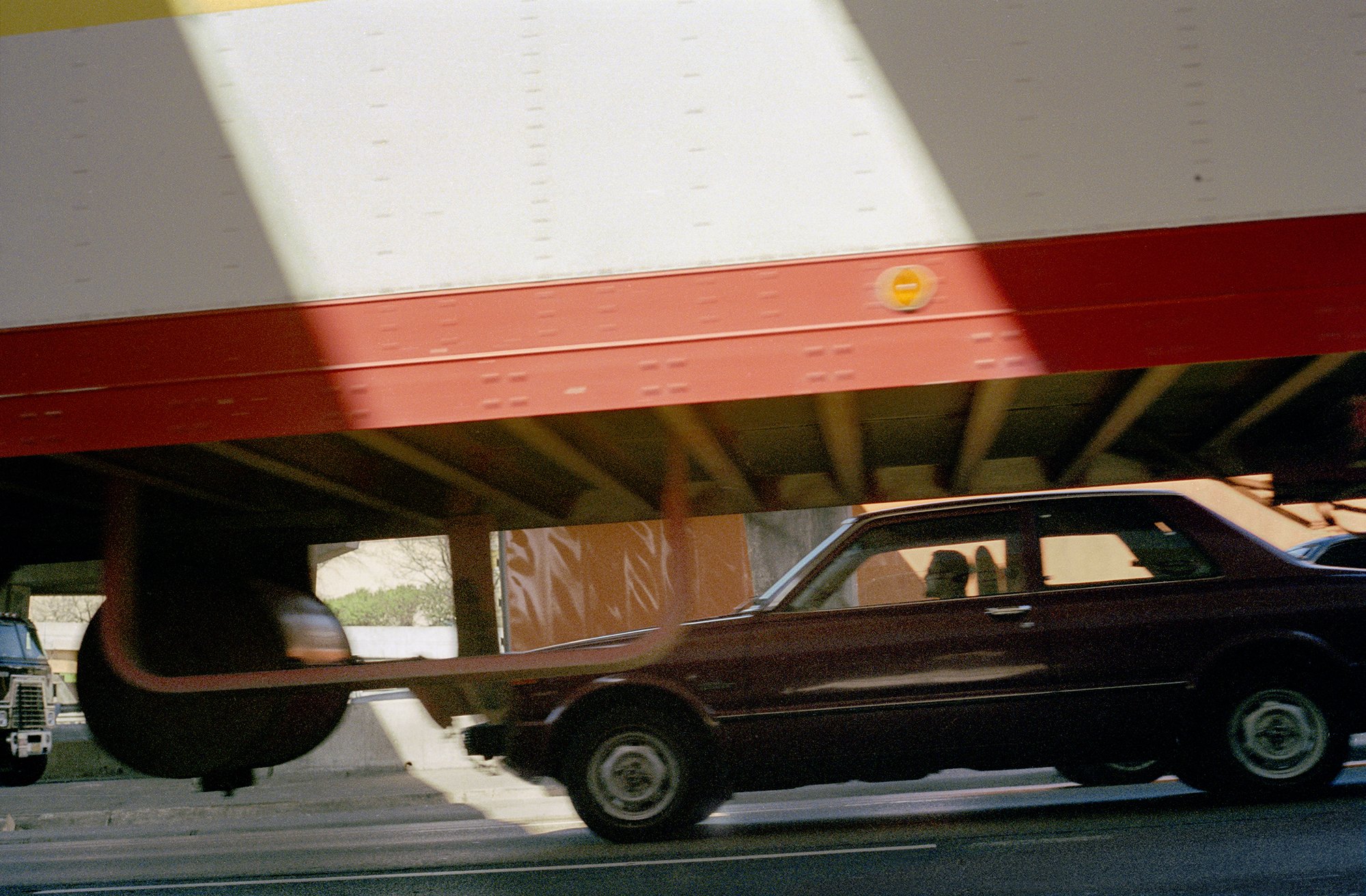  Car Under Truck. 1984. 