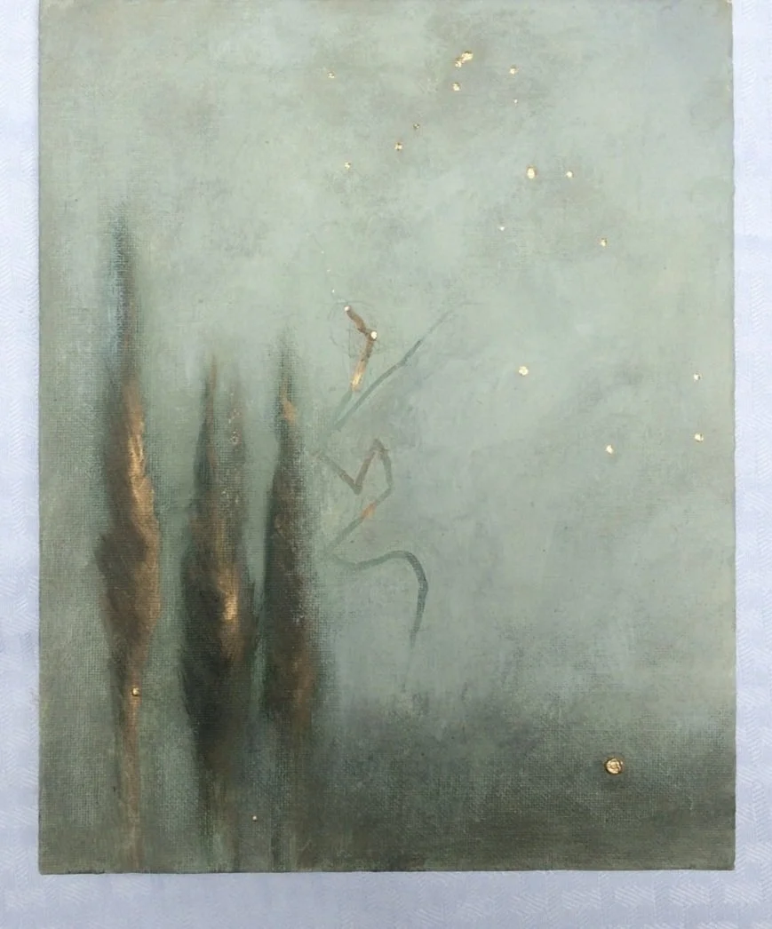 A textured green surface with three dark, elongated vertical shapes on the left and faint gold spots scattered across the surface. There are also some light, curved lines near the center.