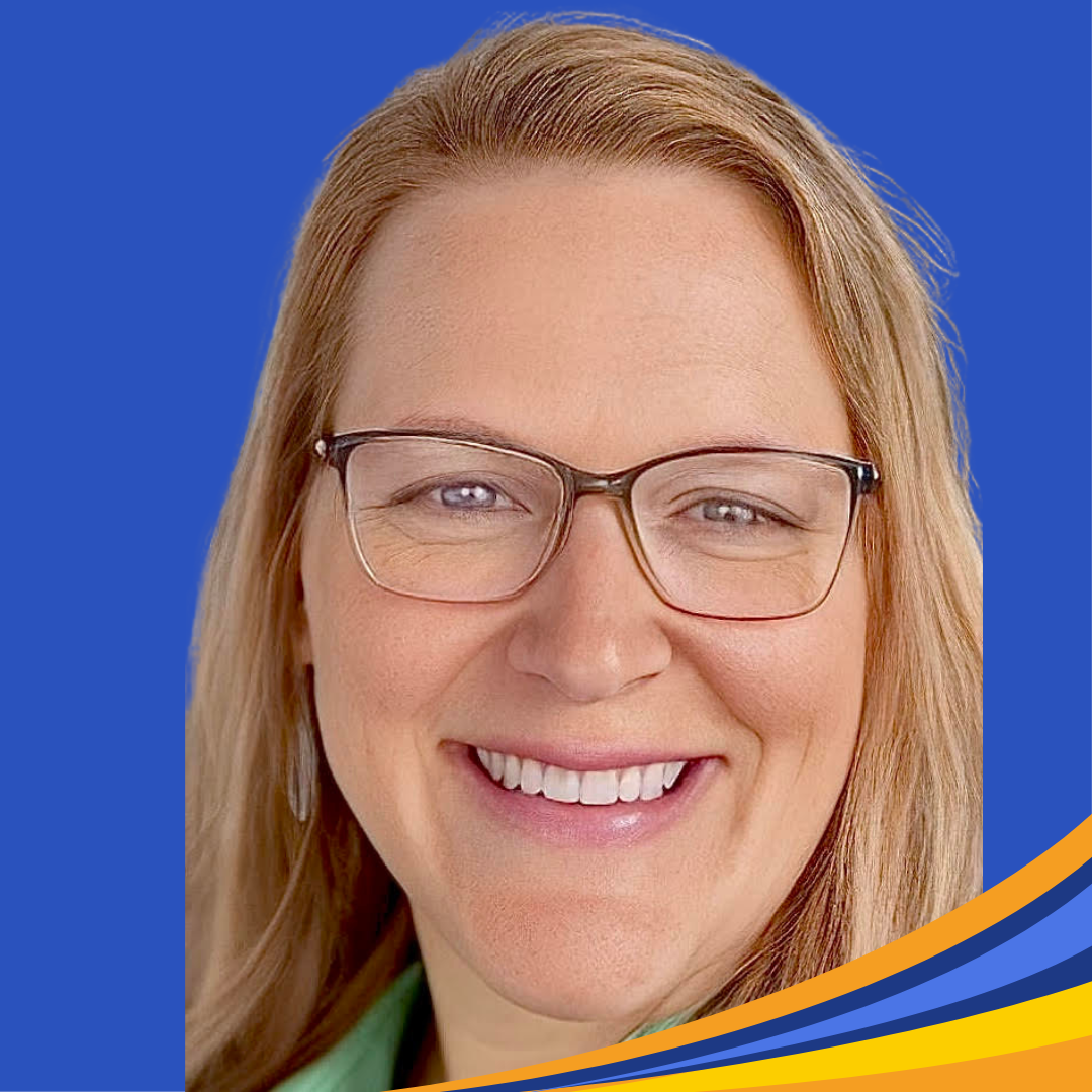 smiling woman with long blonde hair and glasses