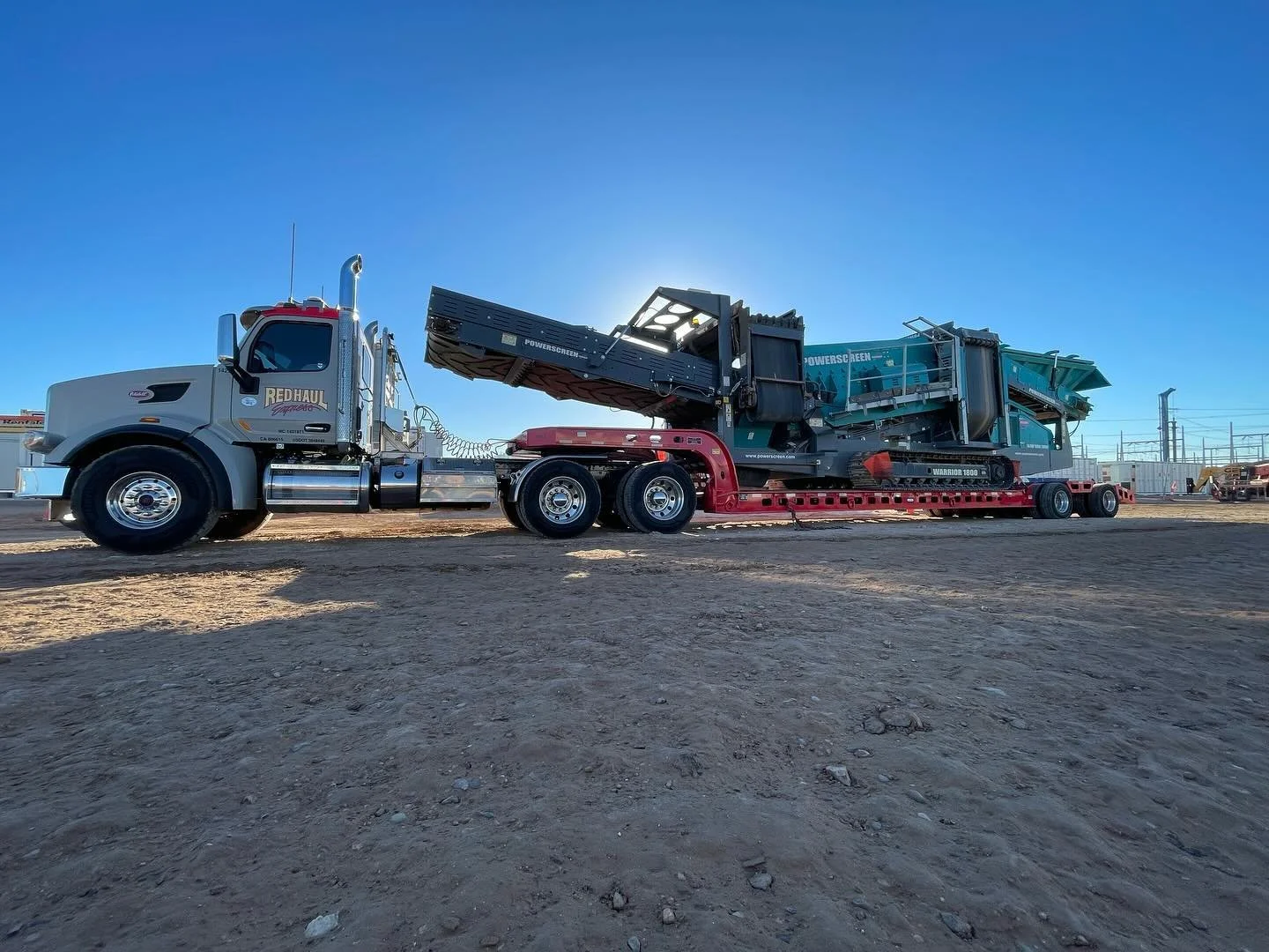 #redhaulexpress #powerscreen #warrior1800 #crusher #crusherplant #screen #construction #material #dirt #recycle #basematerial #rock #heavyhaul #lowbed #trucking #remote #powescreenofcalifornia