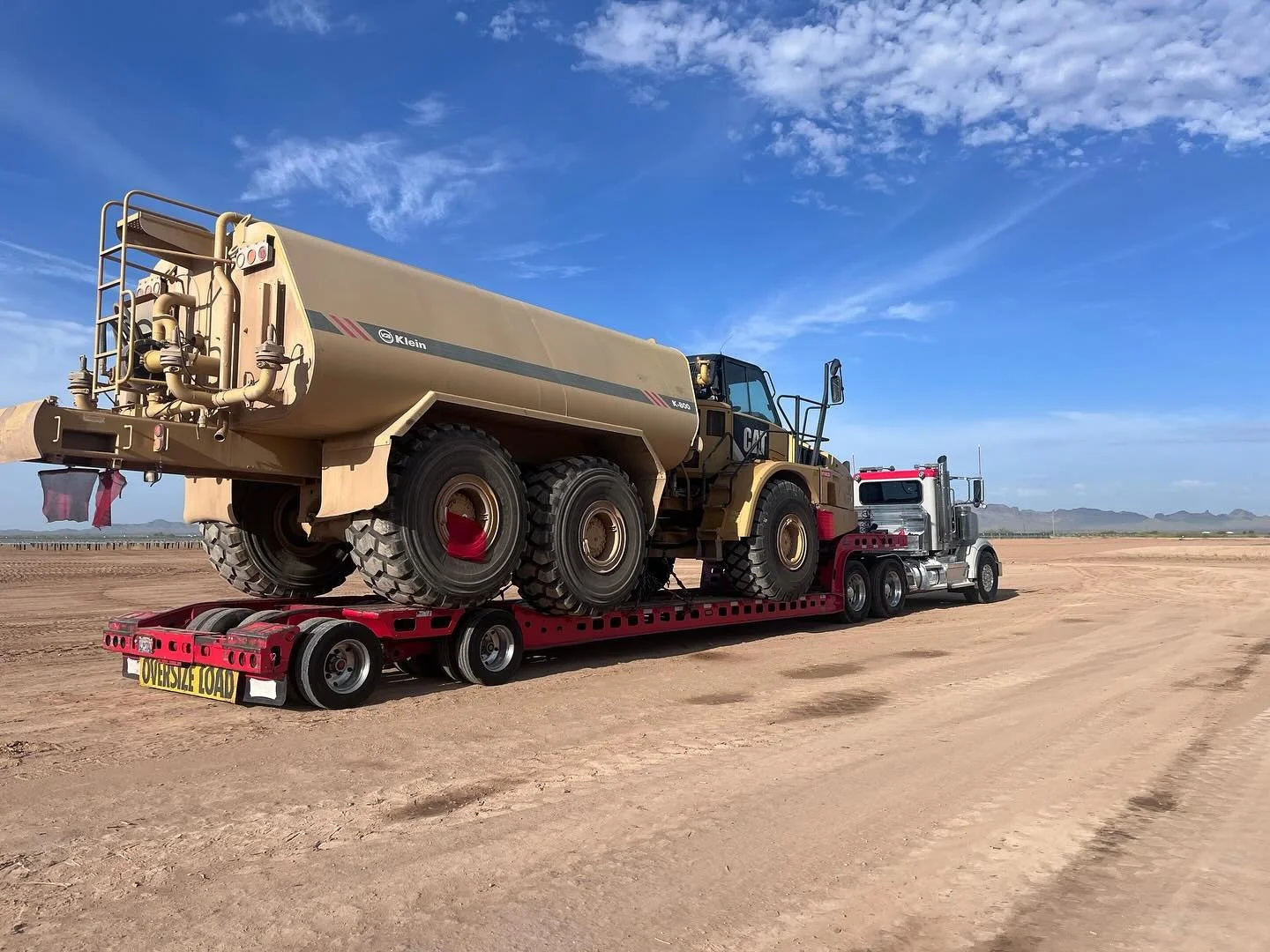 #redhaulexpress #cat #catconstruction #water #watertruck #waterwagon #grade #compaction #klien #rocktruck #lowbed #murraytrailers #original #16tire #civilworks #dirtworld #heavyhaul #westcoast #cpc