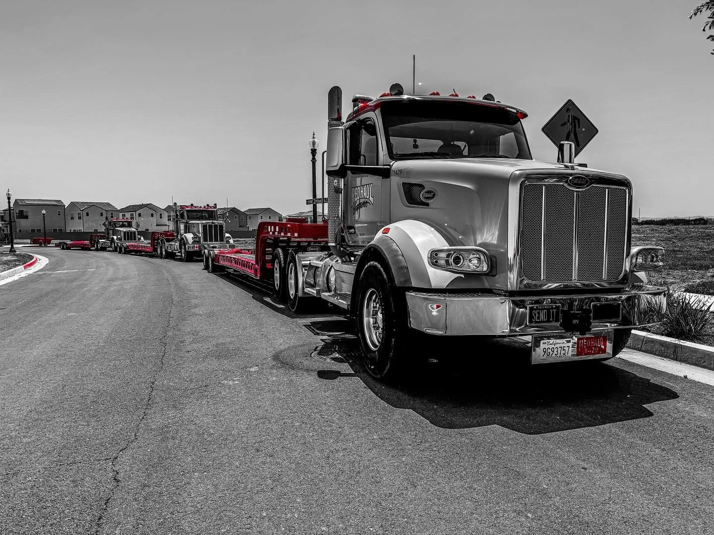 #redhaulexpress #teamwork #trucking #heavyhaulteam #blackandwhite #capture #100 #rolling #lowbed