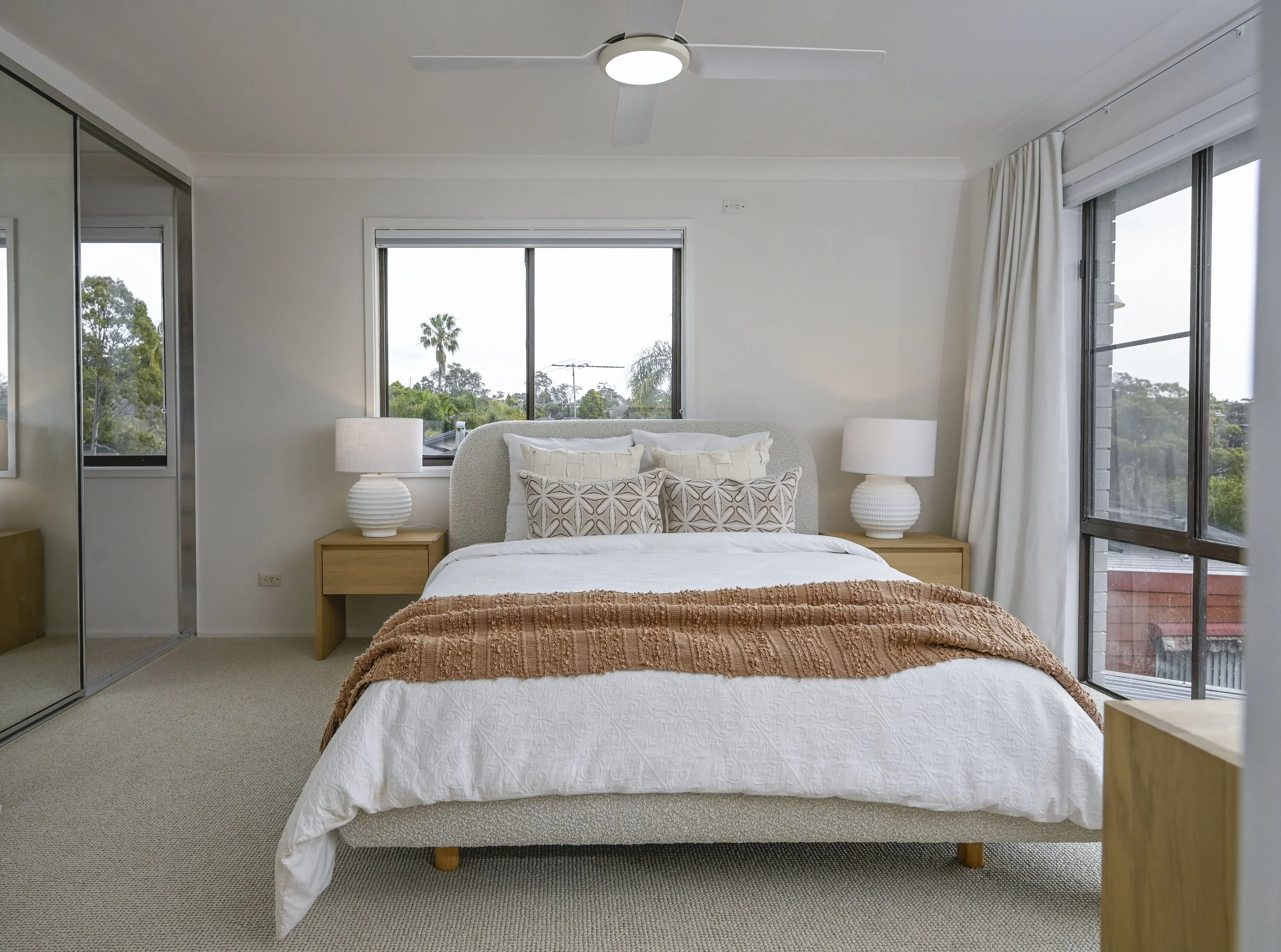 Soft, cohesive bedrooms with new carpet, fresh paint and updated window furnishings