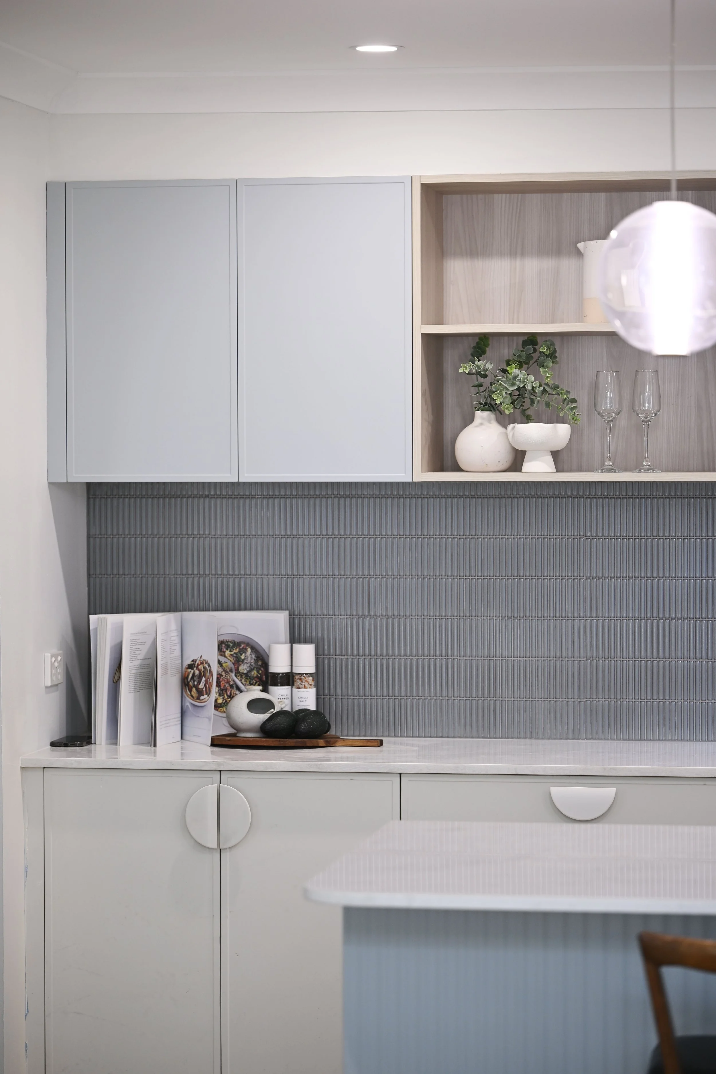 A kitchen with sleek integrated cabinetry on Selling Houses Australia.