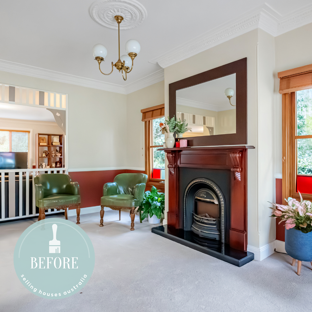 Heavy Federation colours in a cluttered Oatlands living room, where the timber fireplace is the focal point.