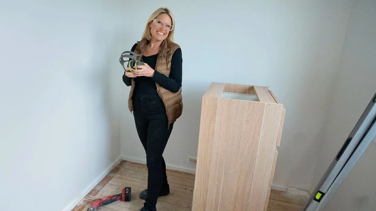 Wendy Moore wearing safety glass and vest on Selling Houses Australia, Yarrawarrah.