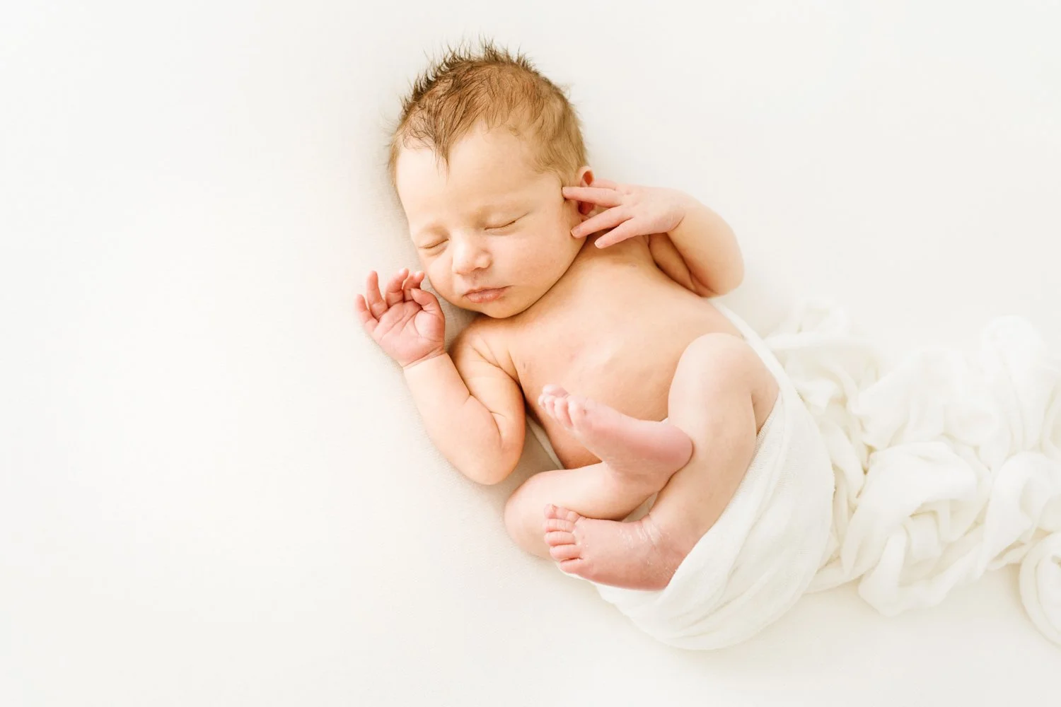 Newborn baby smiling