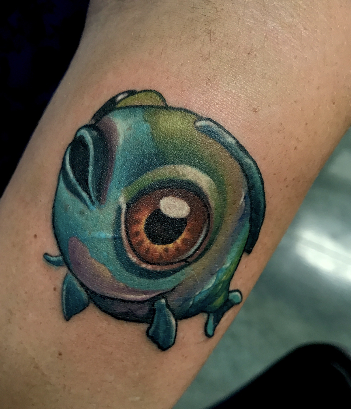 Tattoo of fish animal ball.