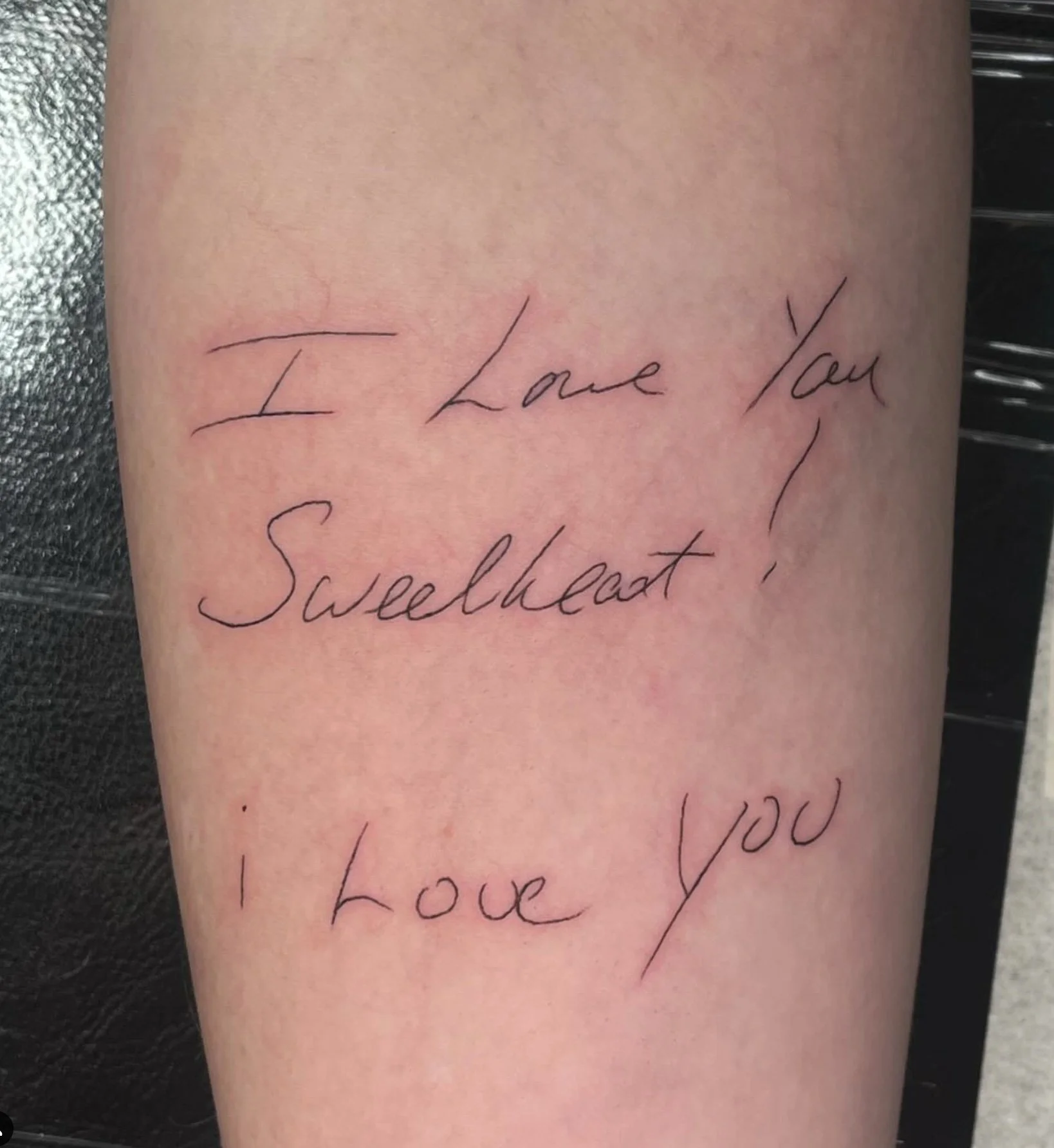 Close-up of a person's skin with a delicate cursive tattoo reading, "I Love You Swetheart."