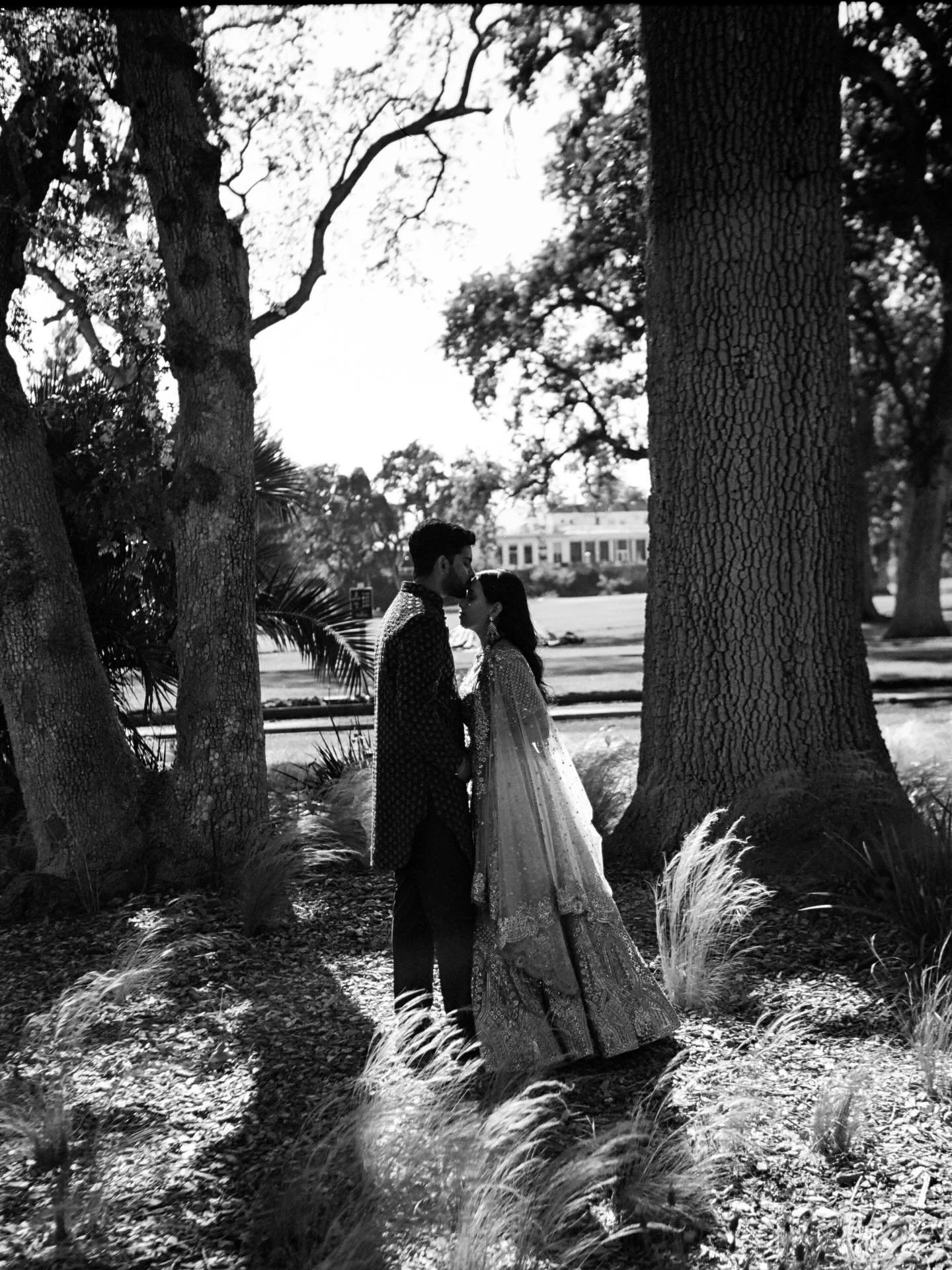 Framed by light and shadow, a quiet moment between two newly married lovers. 

Shot for @niravpatelweddings