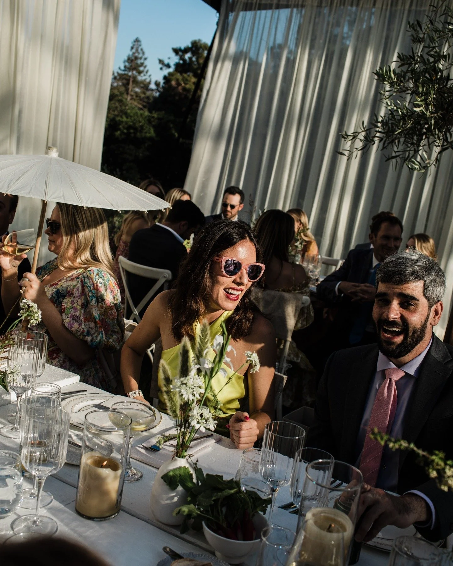 One of my favorite parts of a wedding day: that buzzing moment just after cocktail hour. The room hums with chatter and laughter as guests reconnect, waiting for the grand entrance. I love observing the small interactions that unfold, quietly gatheri