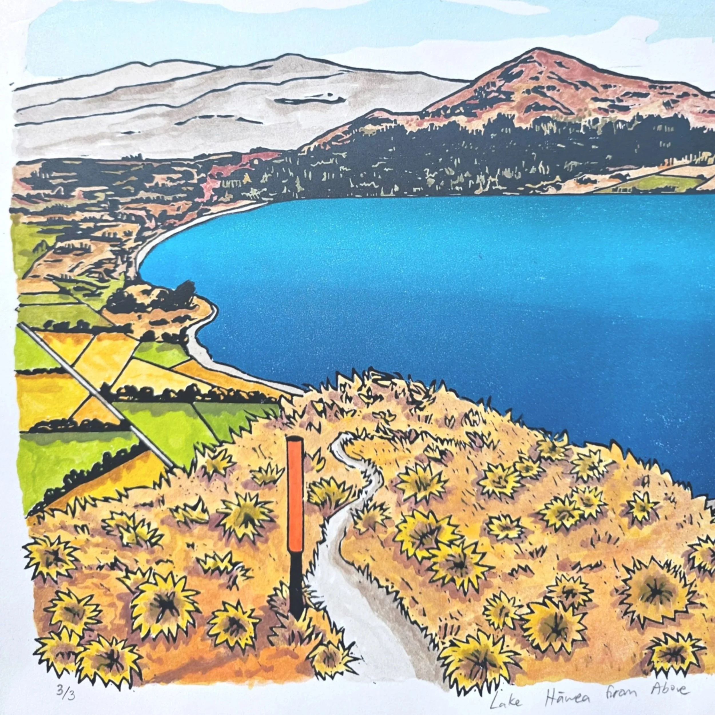 A colourful original hand-painted multi-block linocut artwork of Lake Hāwea.