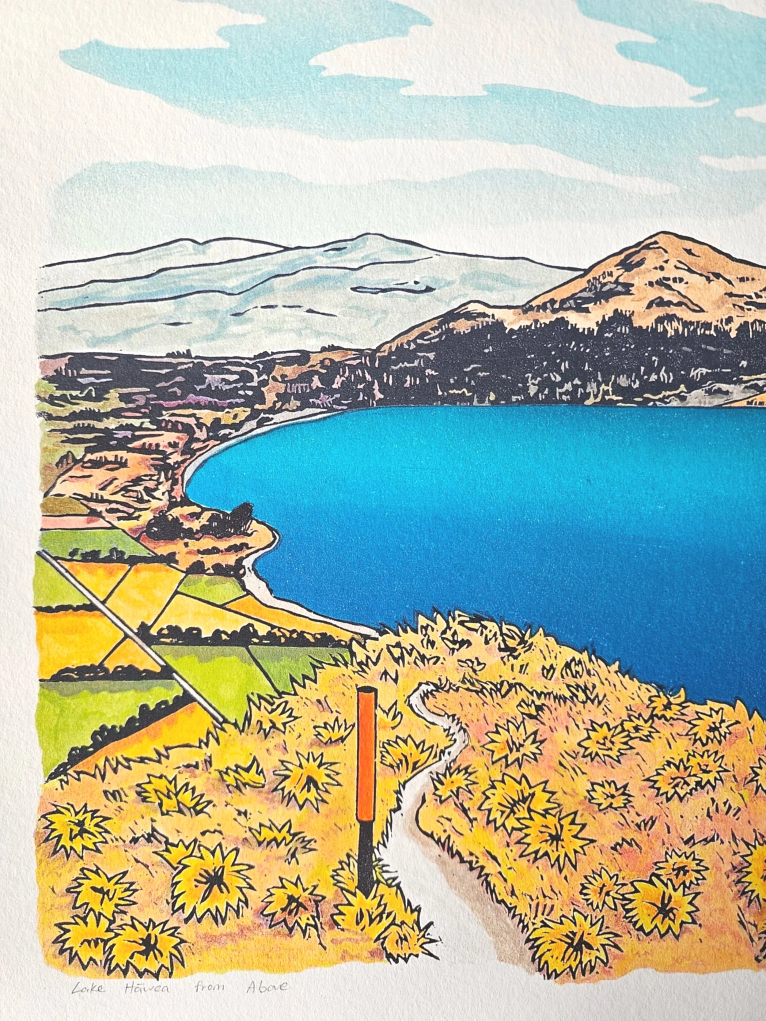 A colourful giclee print of a blue lake hawea with mountains and hills surrounding.