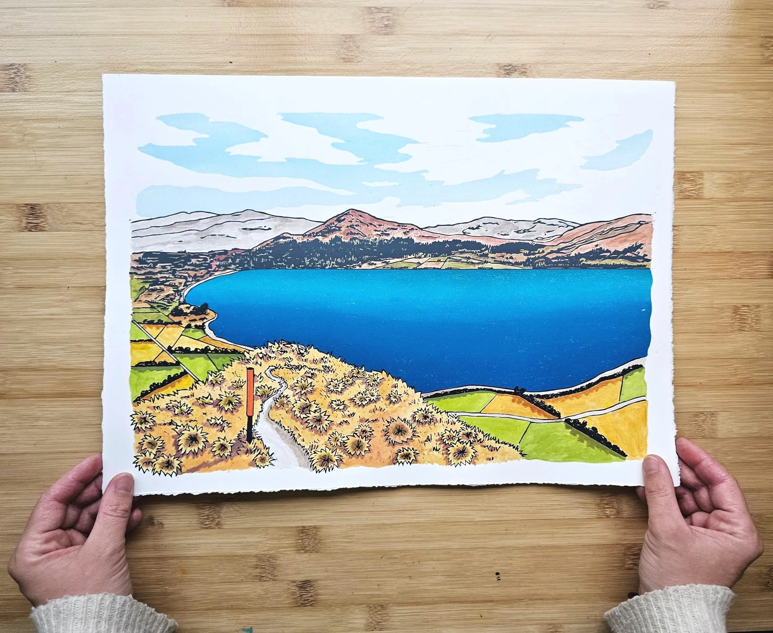 A colourful original hand-painted multi-block linocut artwork of Lake Hāwea.