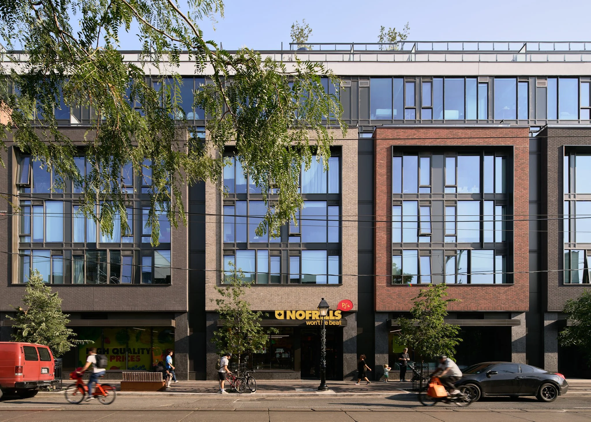 Spring is back on College Street, and we're already looking forward to seeing it come to life again.

Toronto's avenues are at their best when ground floors are active, and buildings give people a reason to slow down. The College Mid-Rise was designe