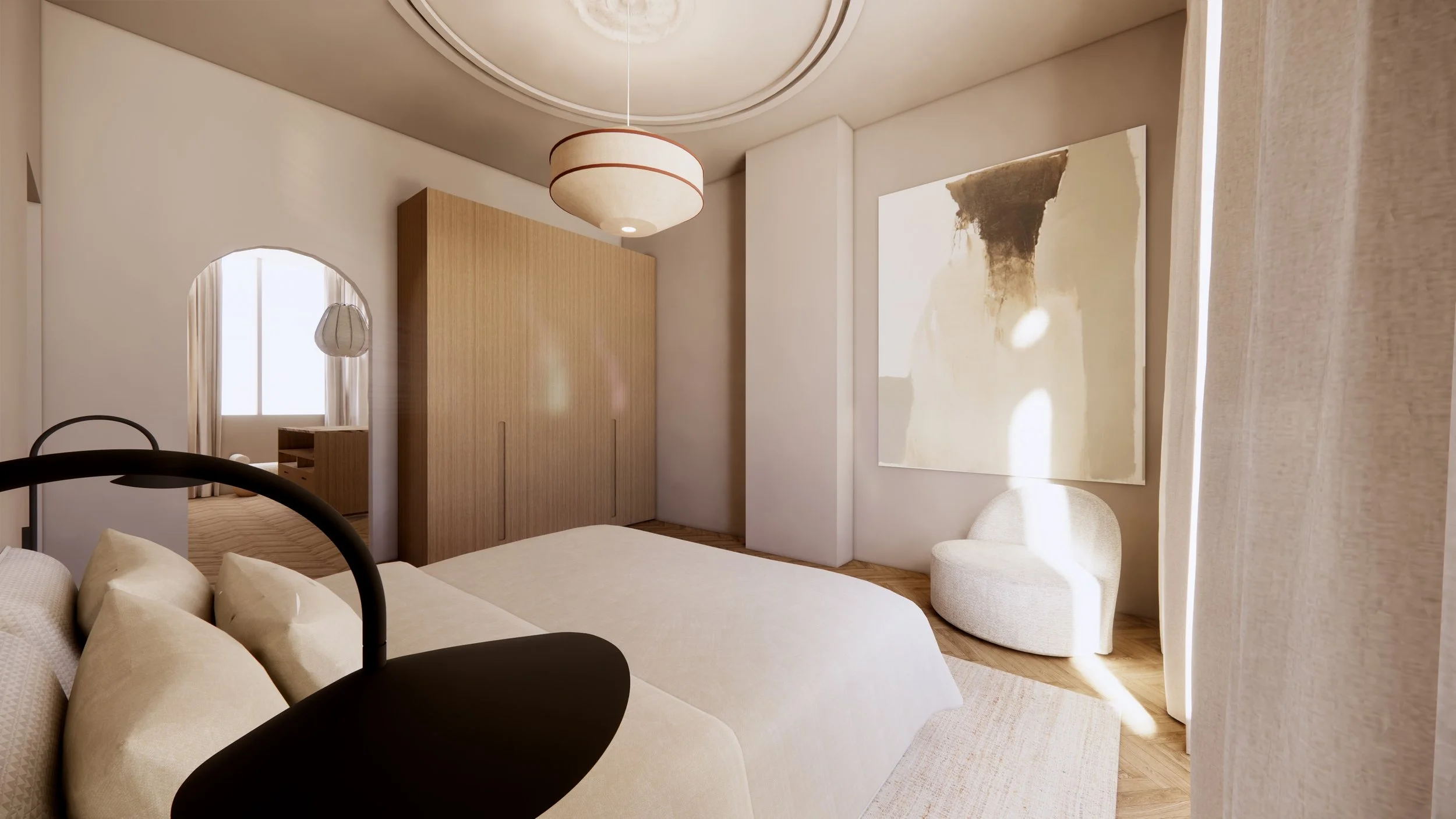 A cozy bedroom with beige bedding, pillows, and a black metal bed frame. There is a large abstract painting on the wall, a white upholstered chair, and natural light coming through beige curtains. A ceiling light fixture hangs from the ceiling.